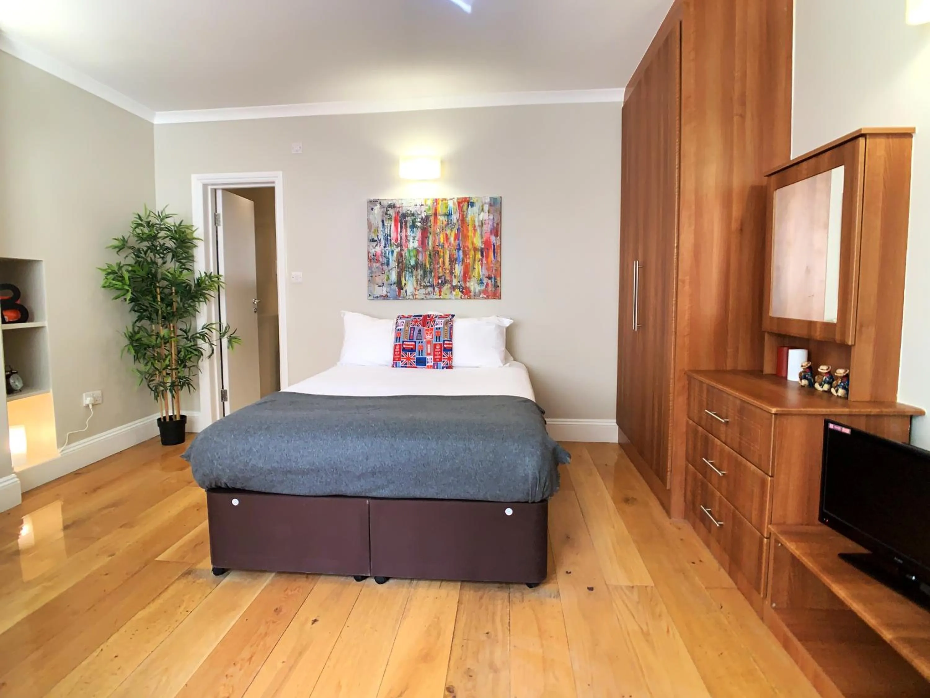 Bed in Queen Victoria Apartments