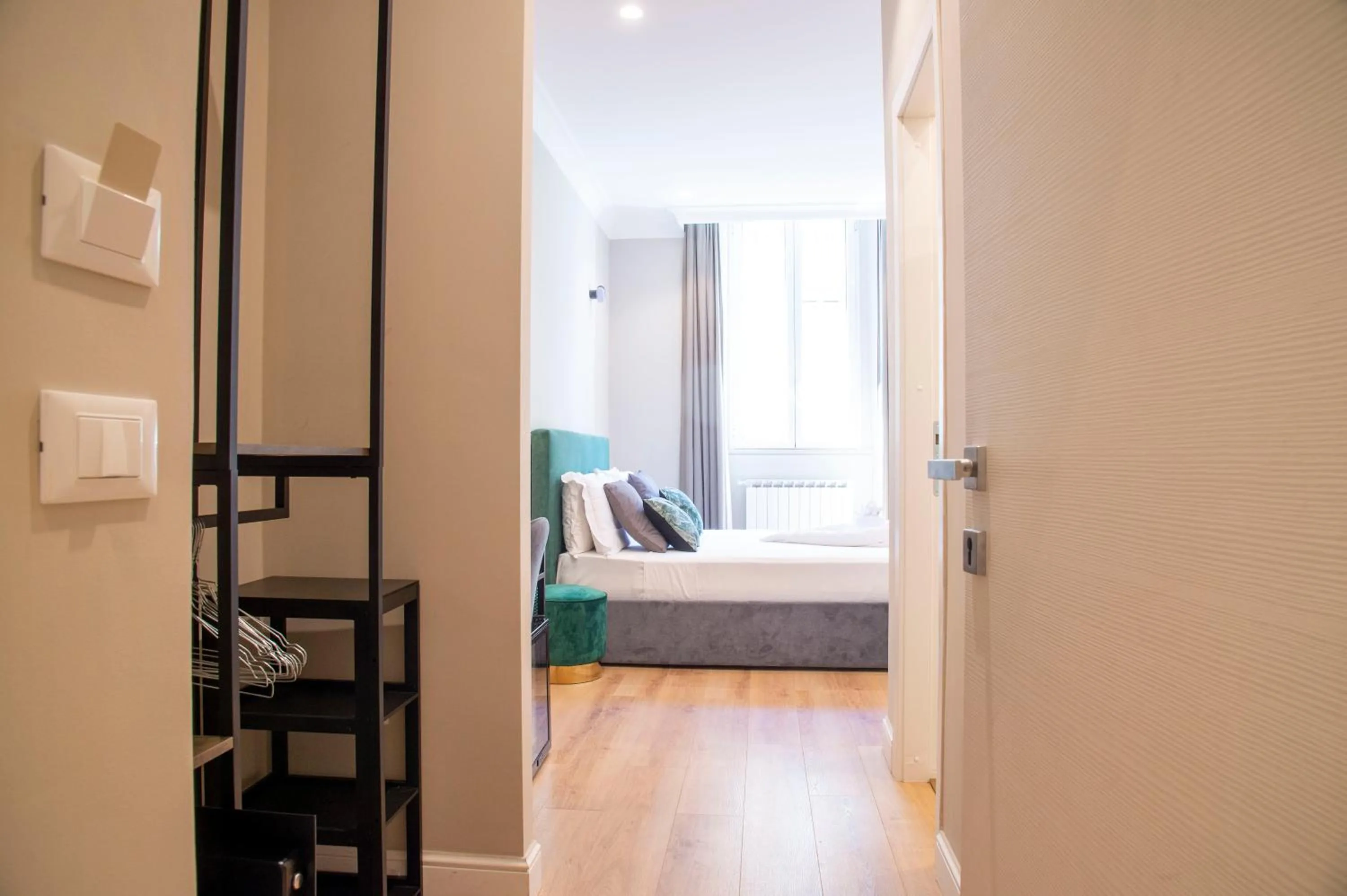 Bed in AD Suites Tritone