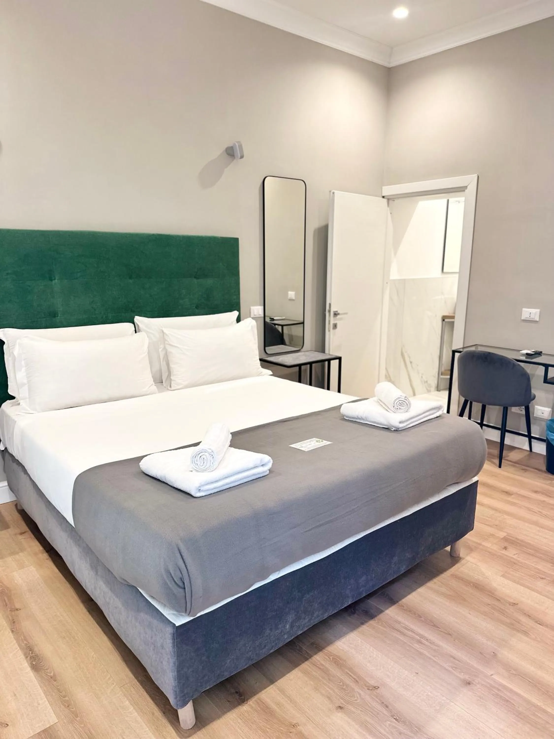 Bed in AD Suites Tritone