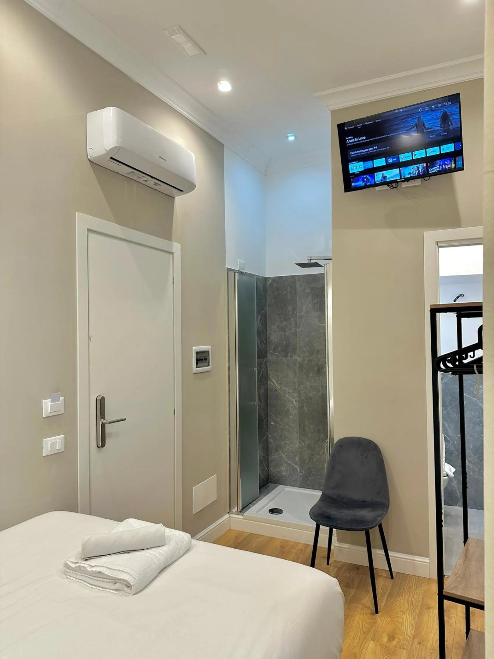 Bed in AD Suites Tritone