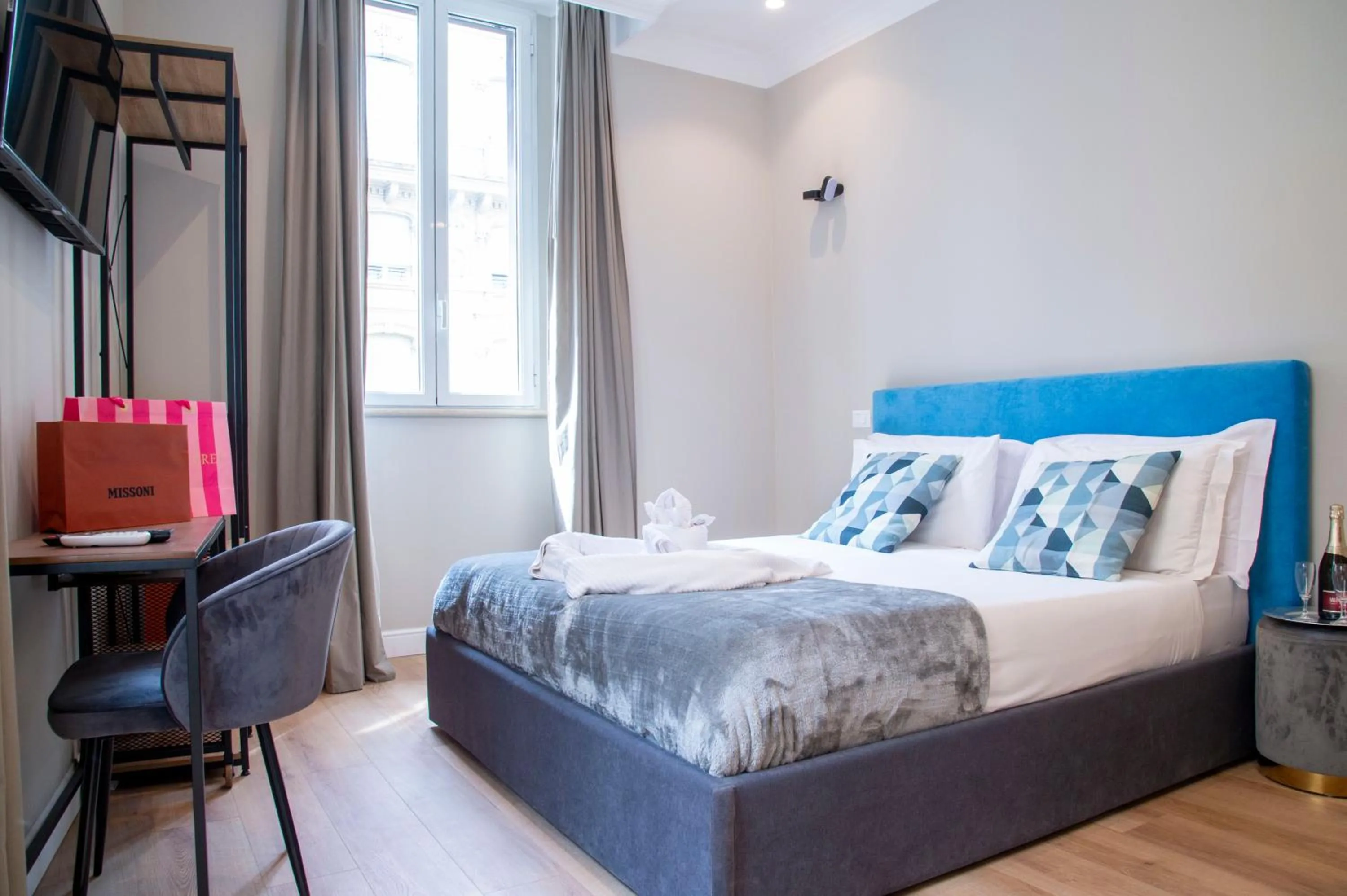 Bed in AD Suites Tritone