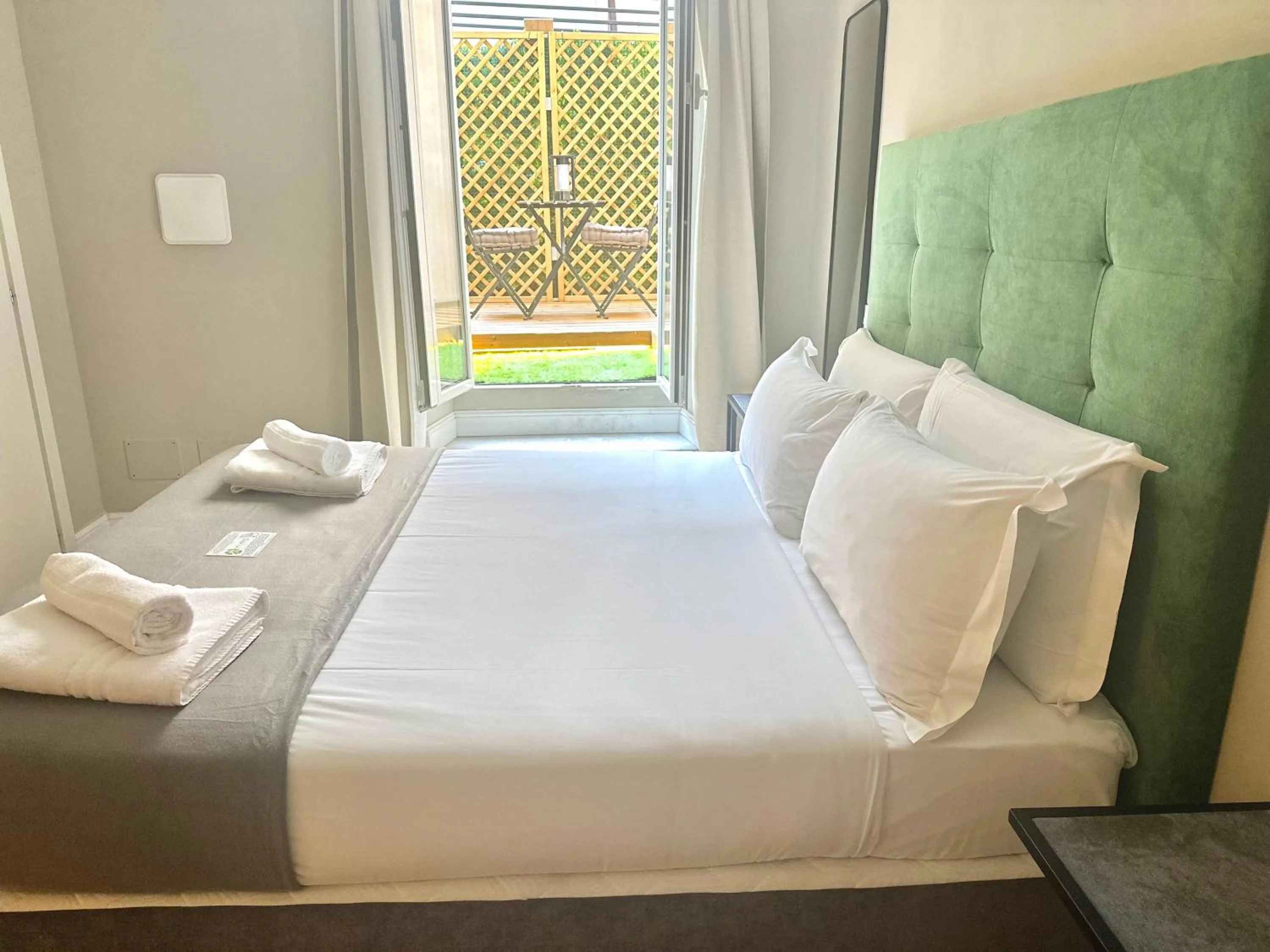 Bed in AD Suites Tritone