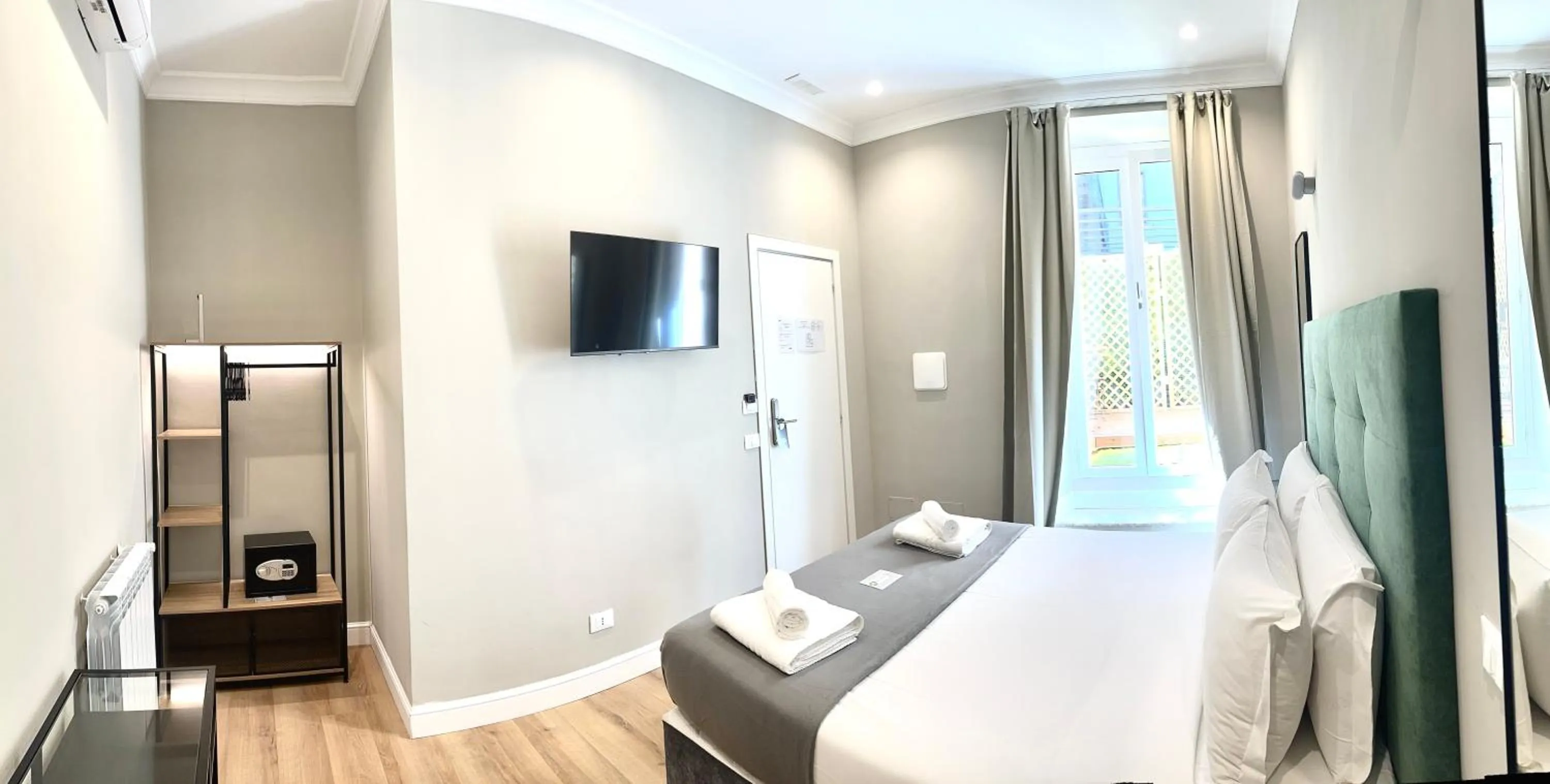 Bed in AD Suites Tritone