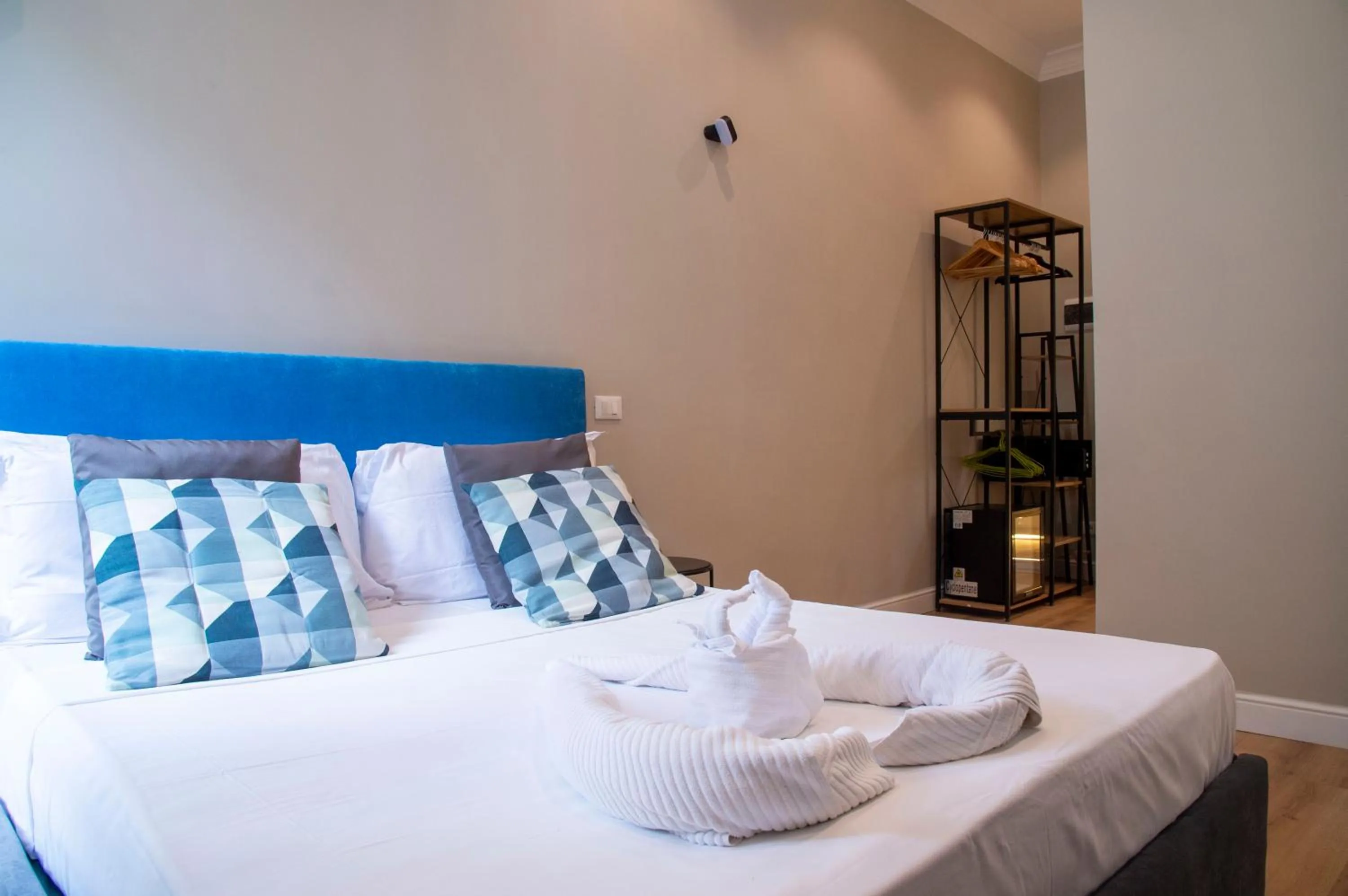 Bed in AD Suites Tritone