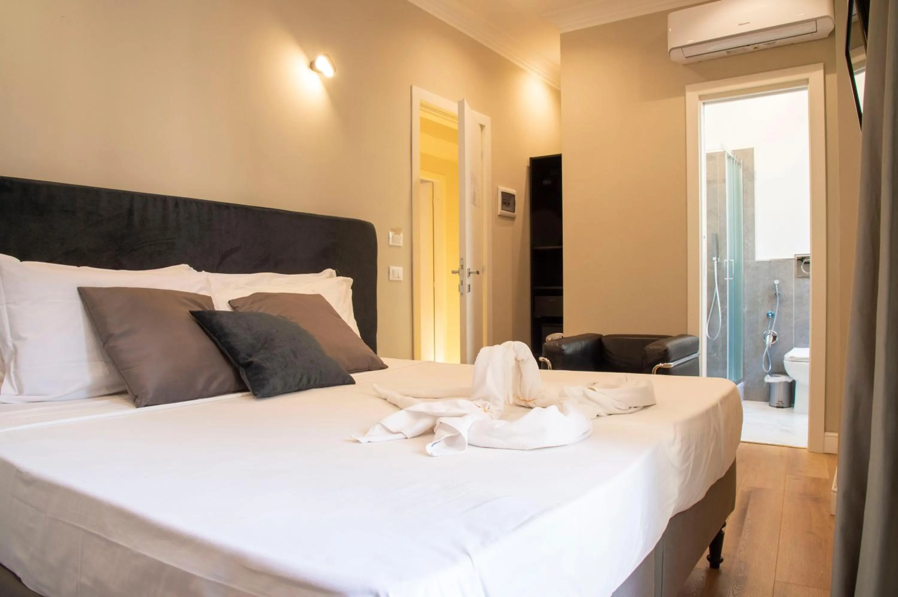 Bed in AD Suites Tritone