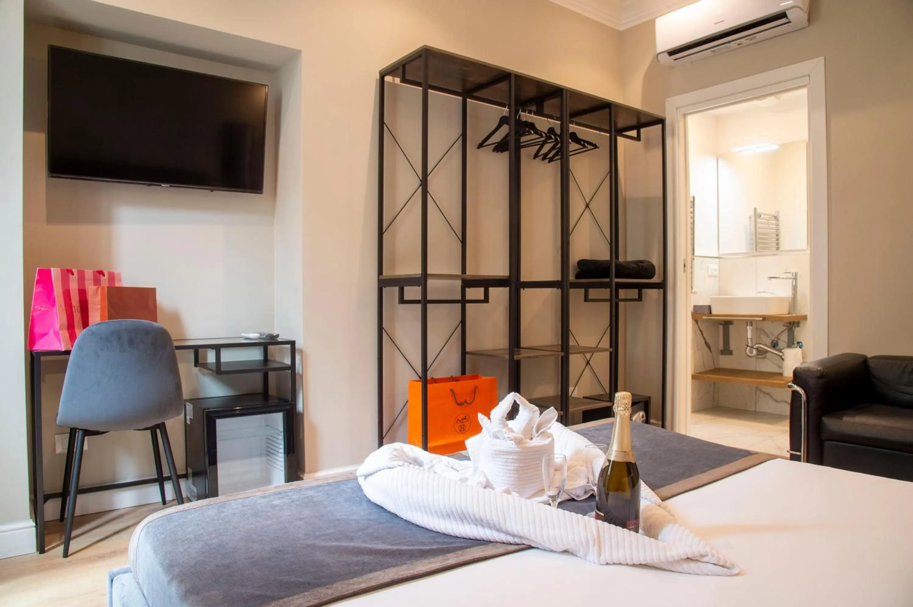 Bed in AD Suites Tritone