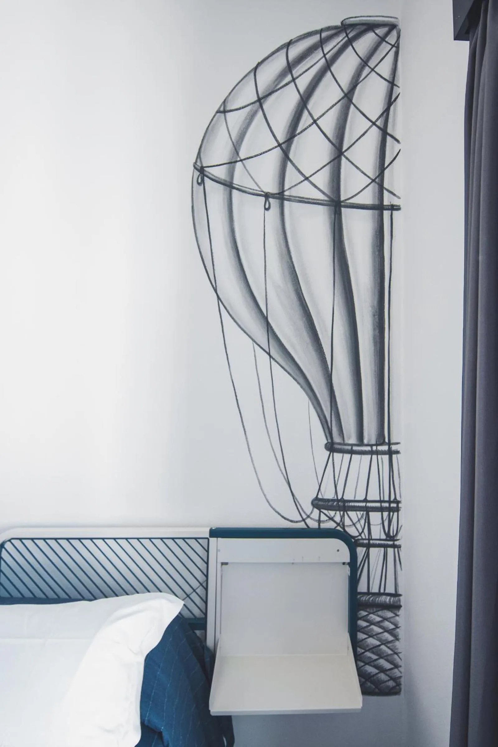 Decorative detail, Bed in Ostello Bello Genova