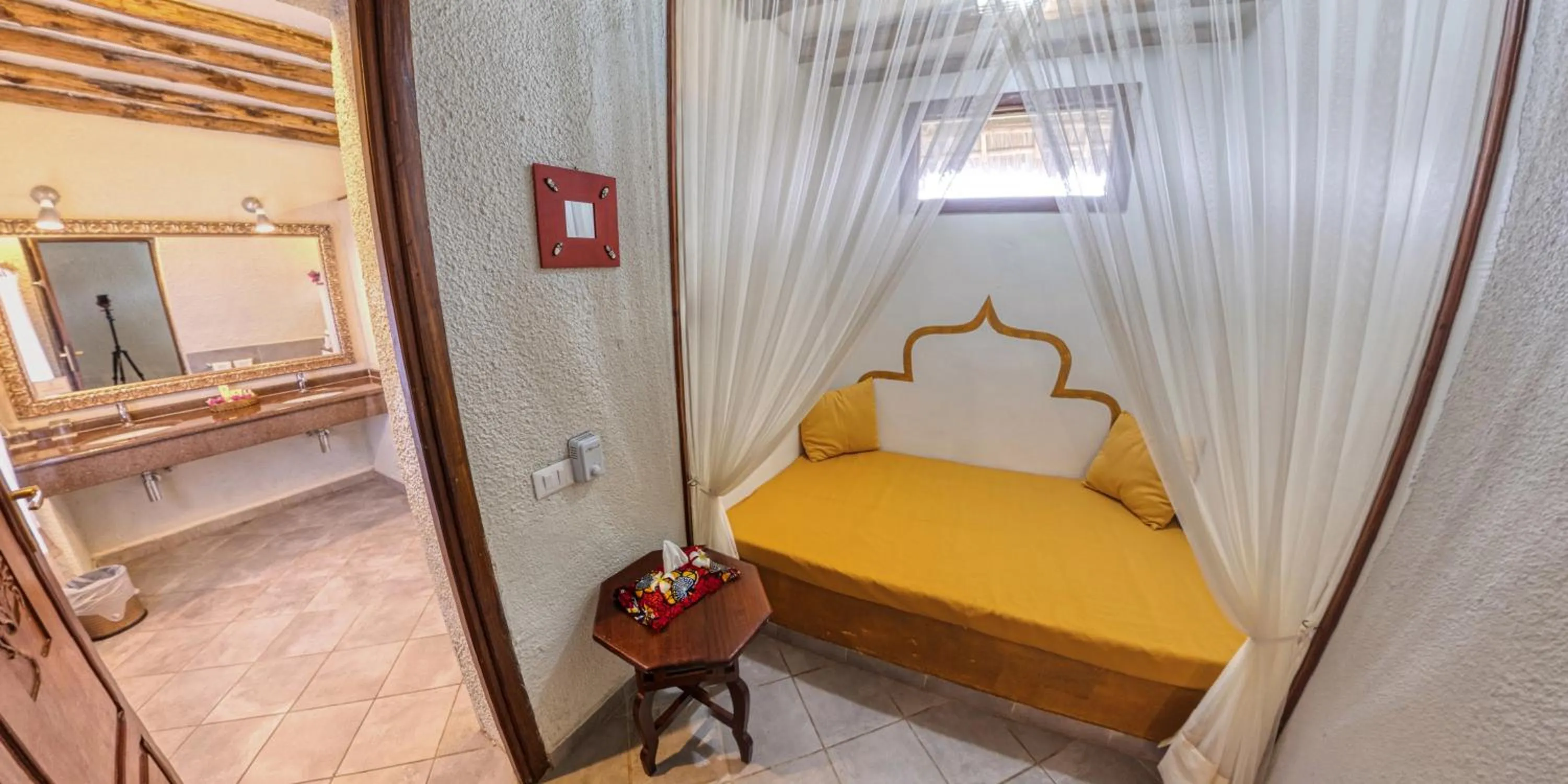 Bed in Karafuu Beach Resort & Spa