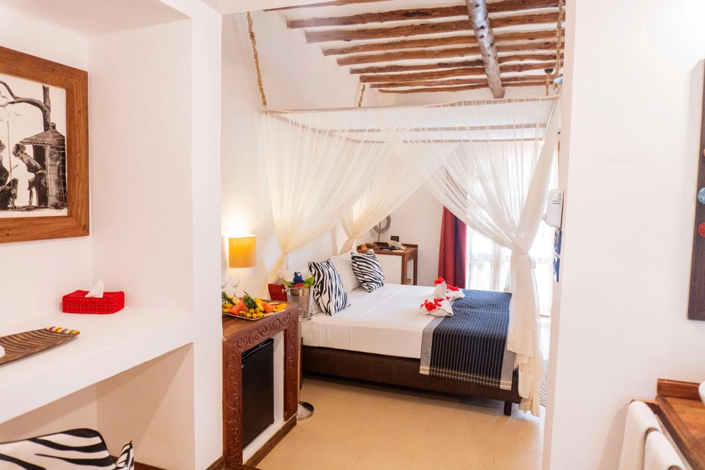 Bed in Karafuu Beach Resort & Spa