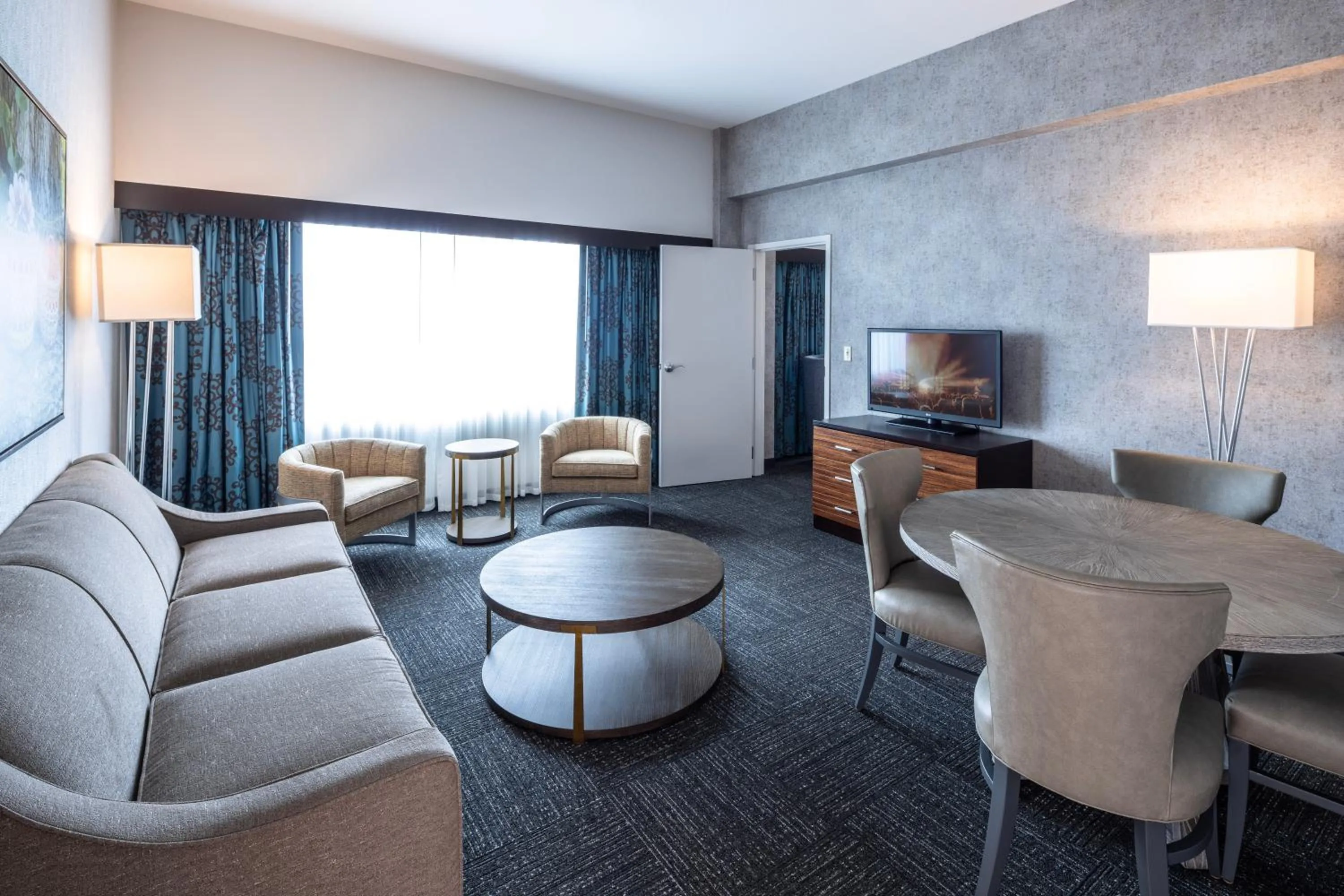 Living room in Akwesasne Mohawk Casino Resort and Players Inn Hotel -formerly Comfort Inn and Suites Hogansburg NY