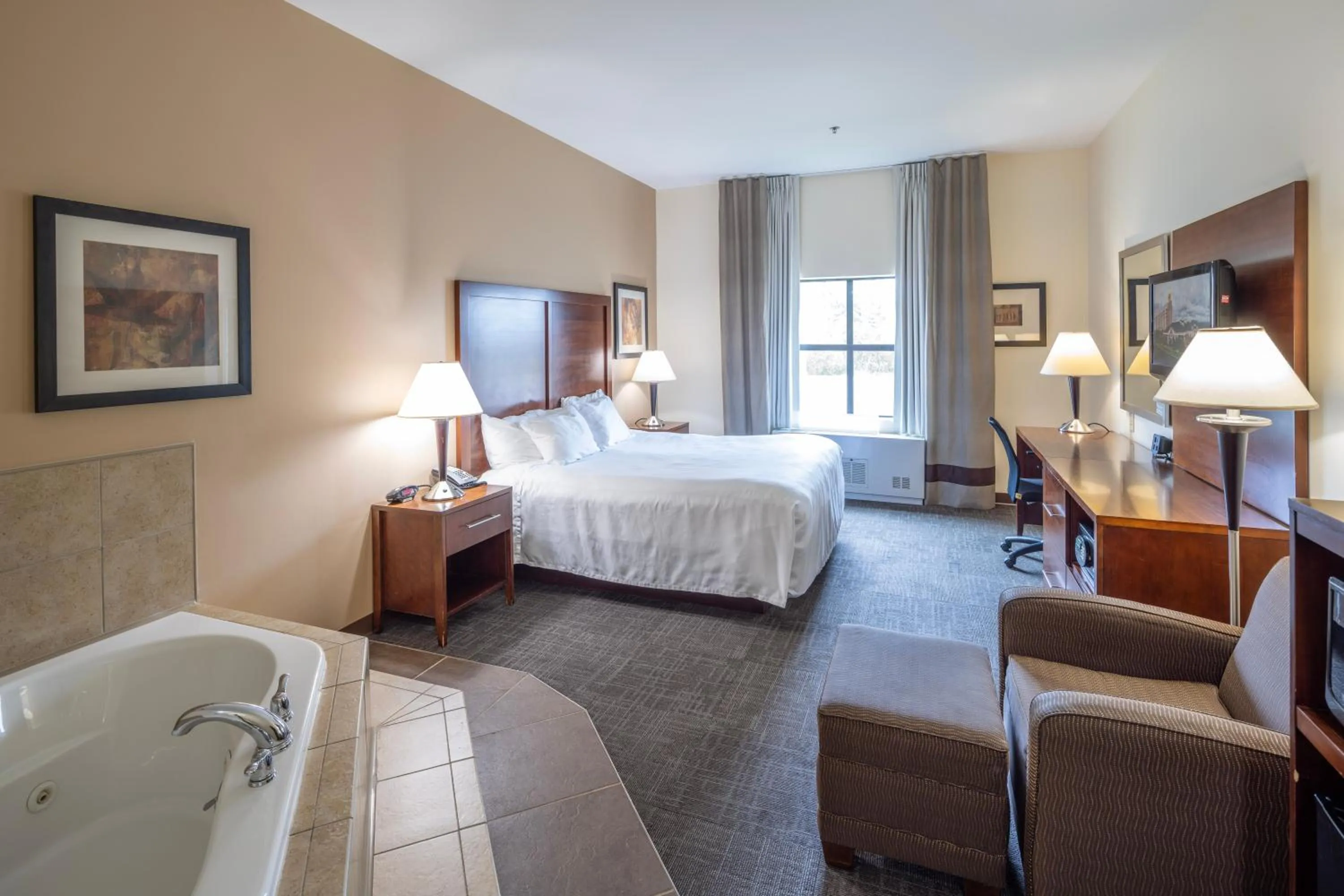 Bed in Akwesasne Mohawk Casino Resort and Players Inn Hotel -formerly Comfort Inn and Suites Hogansburg NY