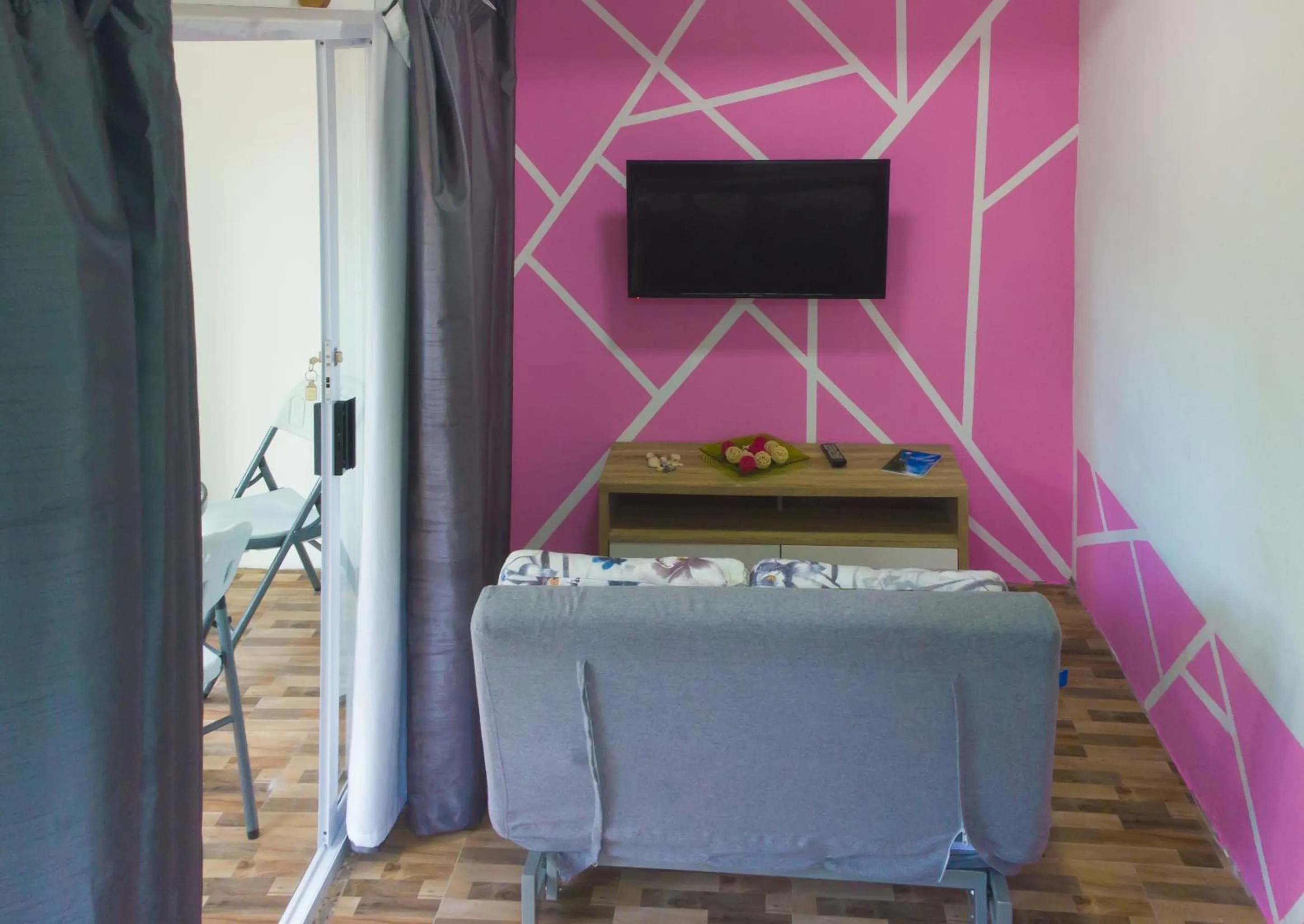 Communal lounge/ TV room in Villa Rafia