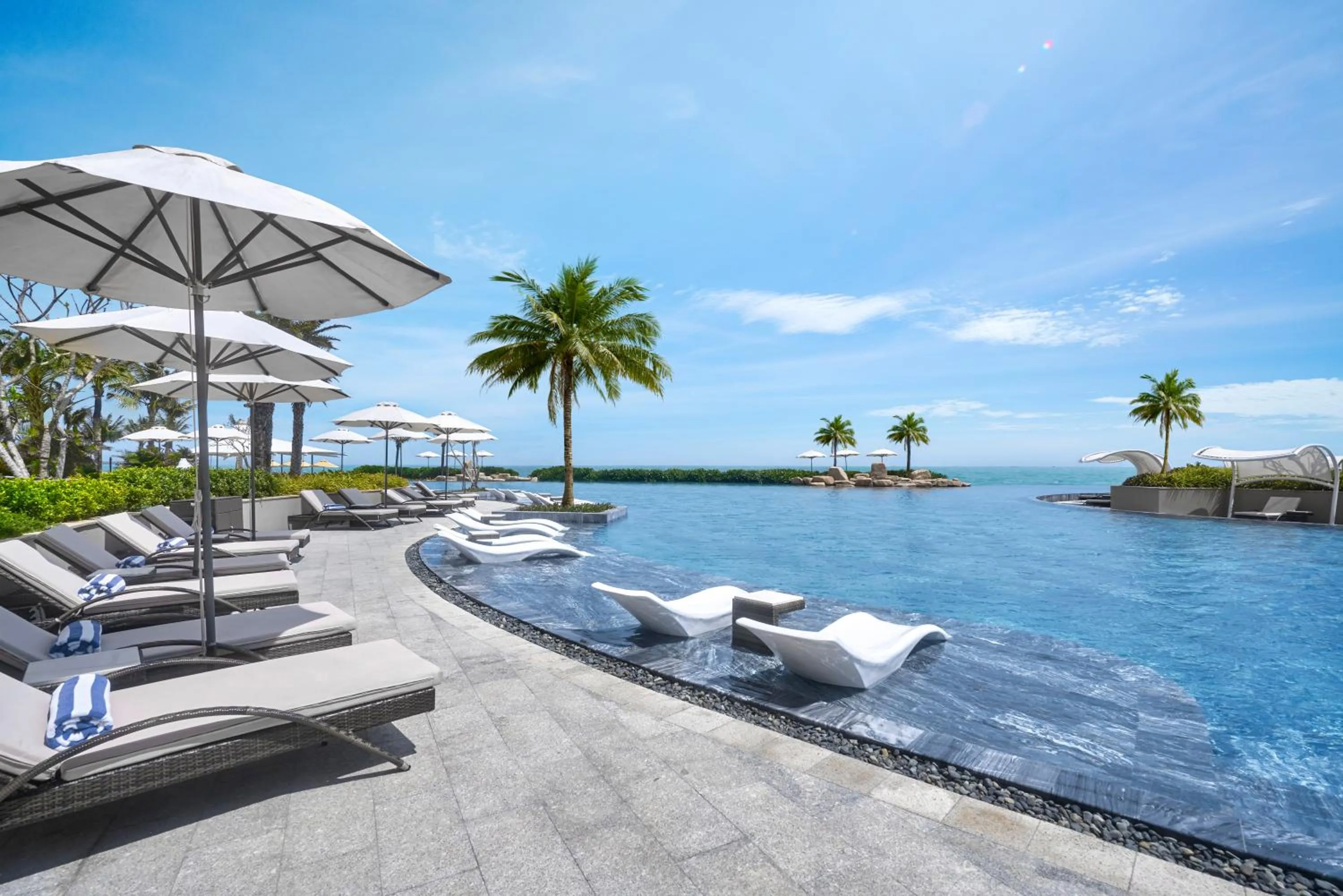 Swimming pool in Holiday Inn Resort Ho Tram Beach by IHG