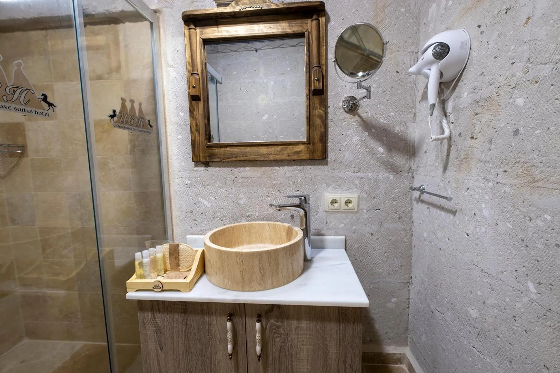 Shower in Underground Cave Suites Hotel