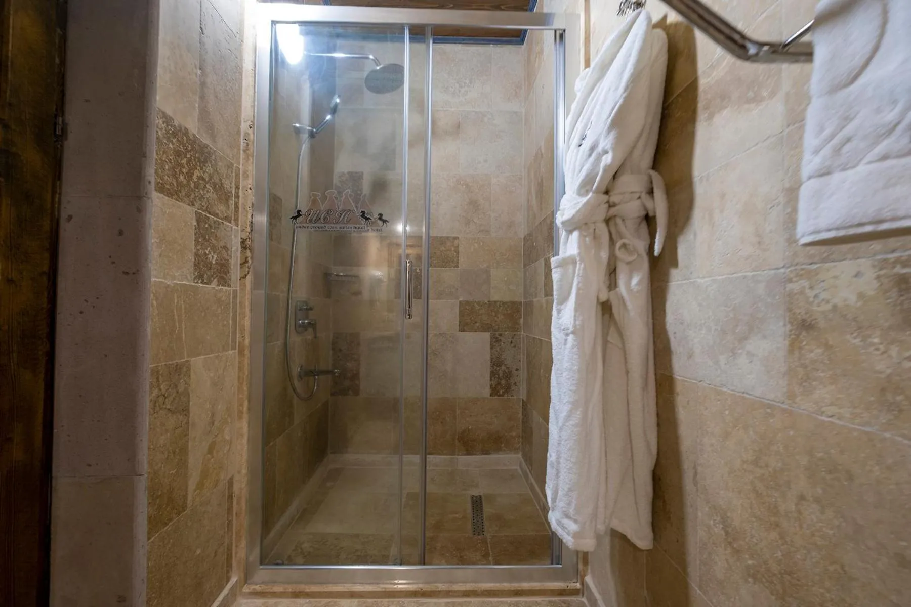 Shower in Underground Cave Suites Hotel