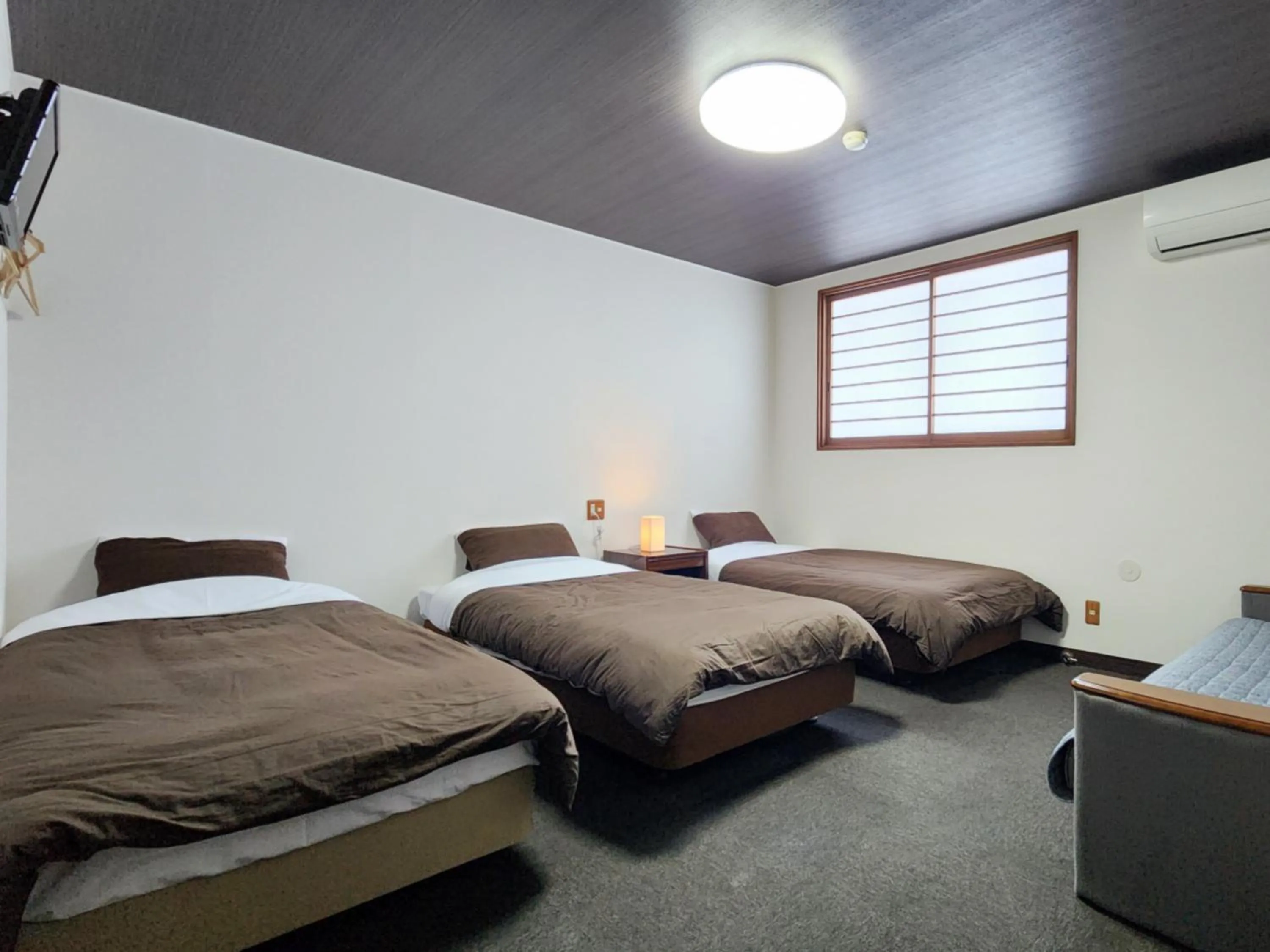 Photo of the whole room, Bed in Pension Kobekko