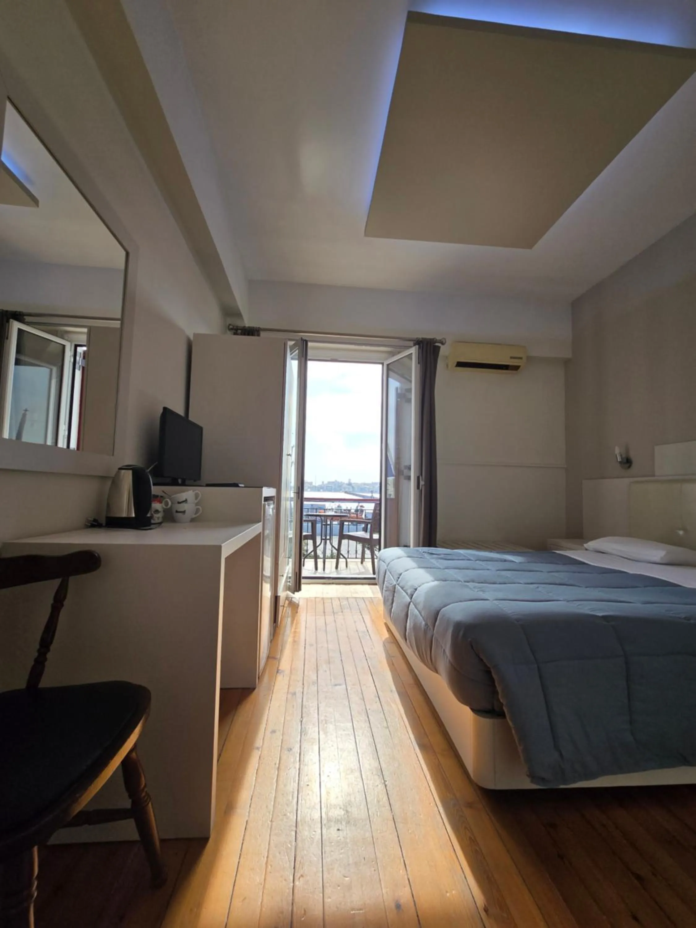 Bed in Aegean Sea Rooms