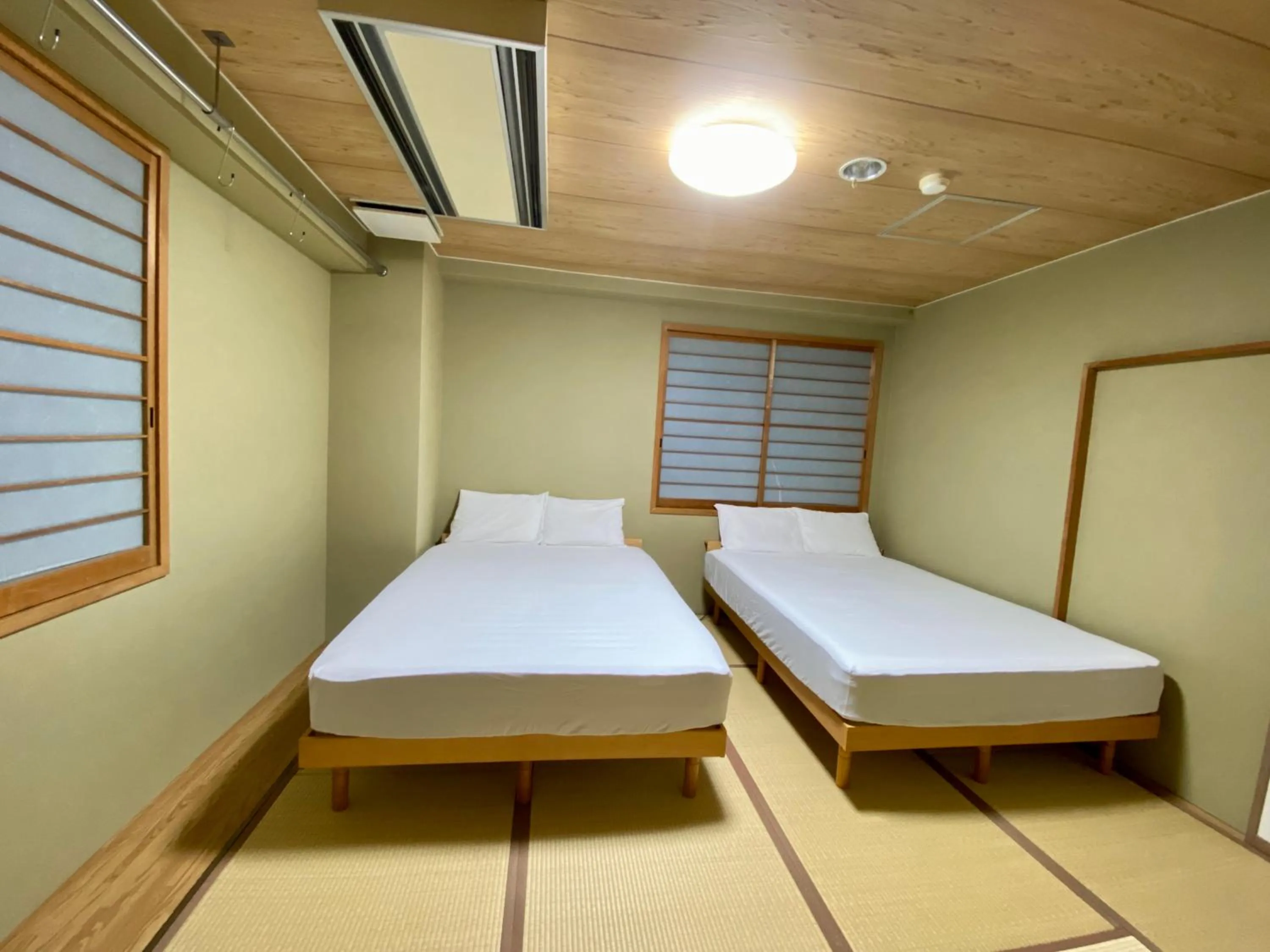 Bed in Hakuba King Hotel