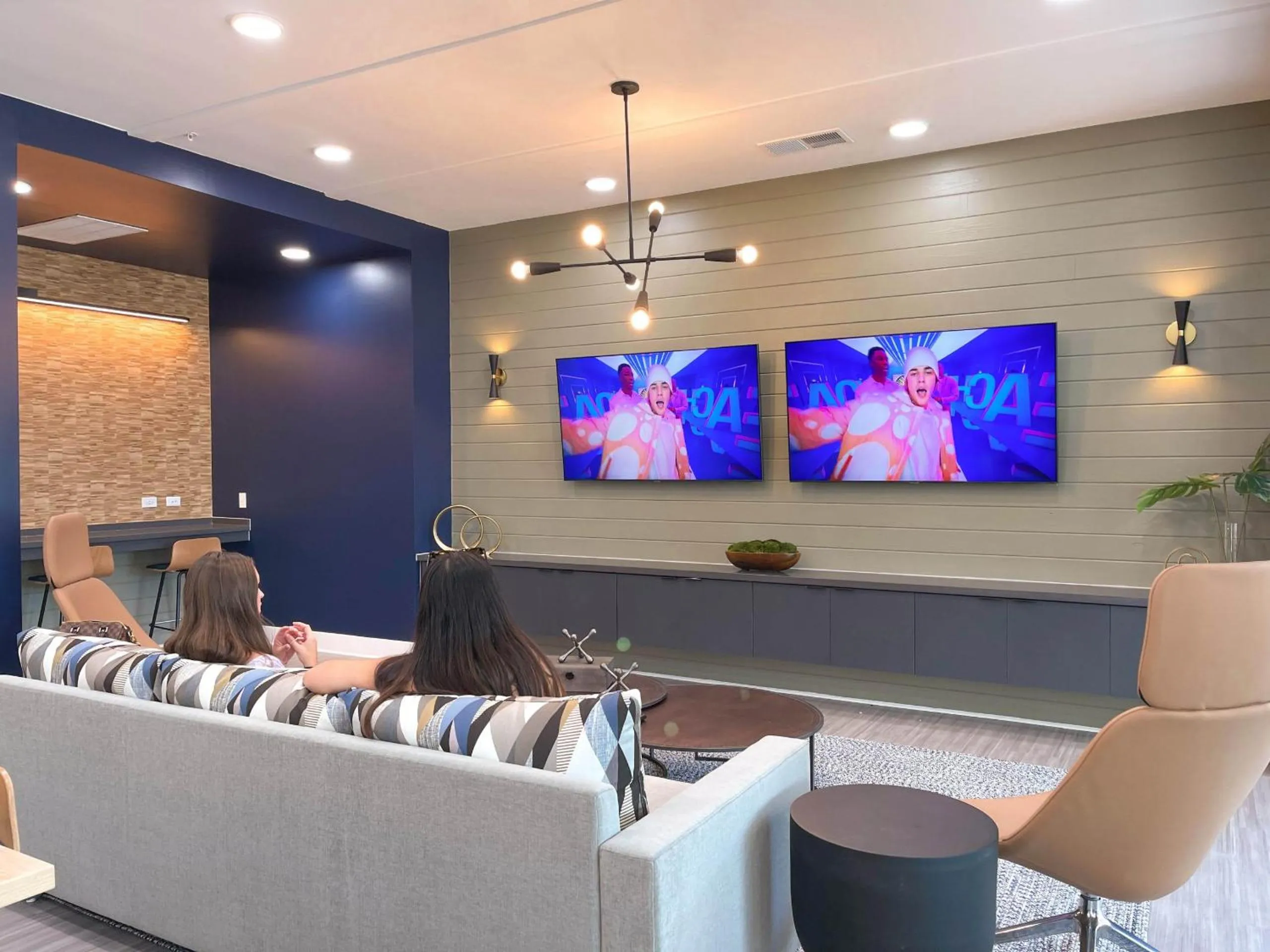 Communal lounge/ TV room in Luxe One Bedroom Apartment with Balcony