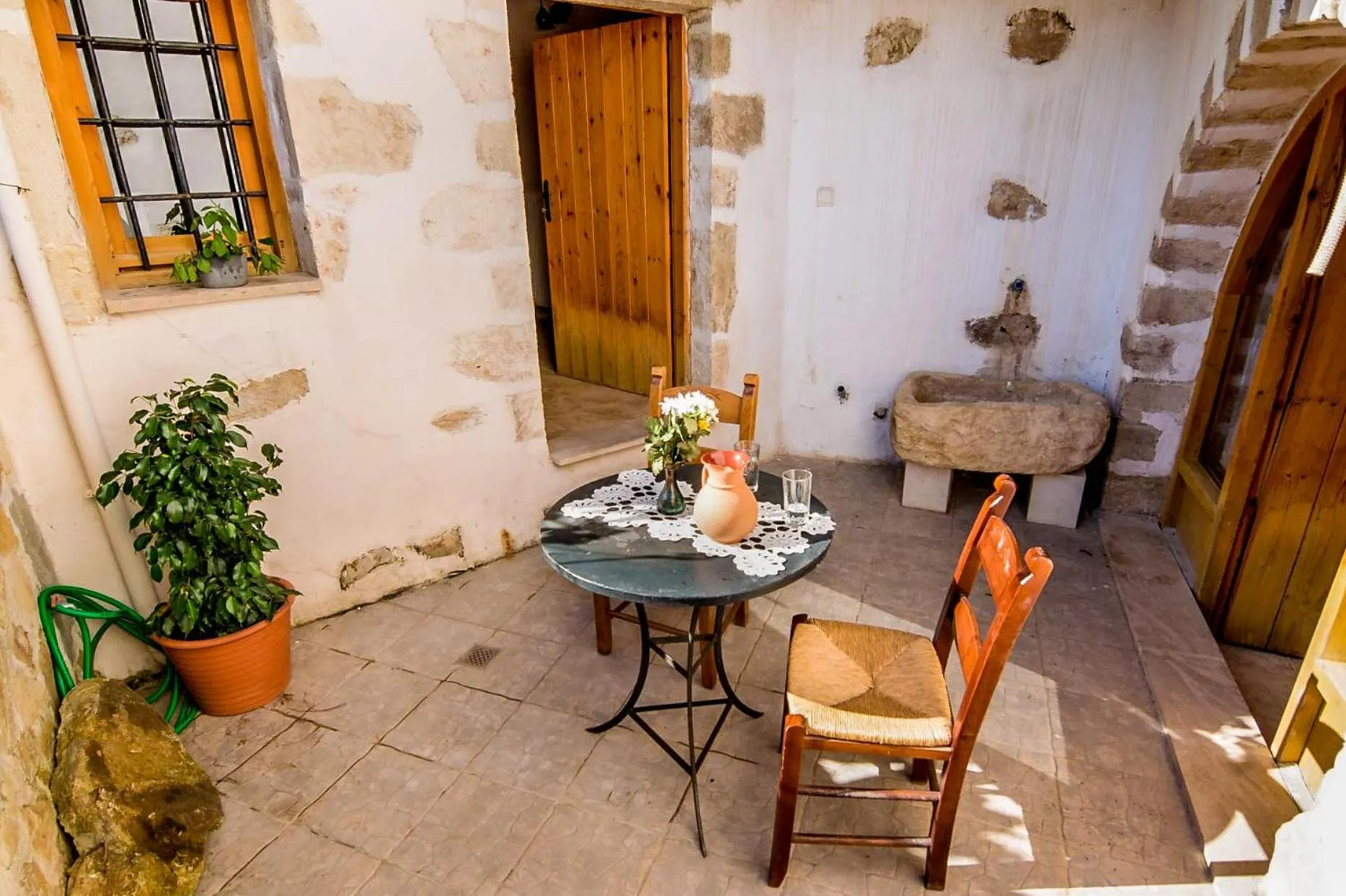 Inner courtyard view in Vafes Traditional Stone Houses