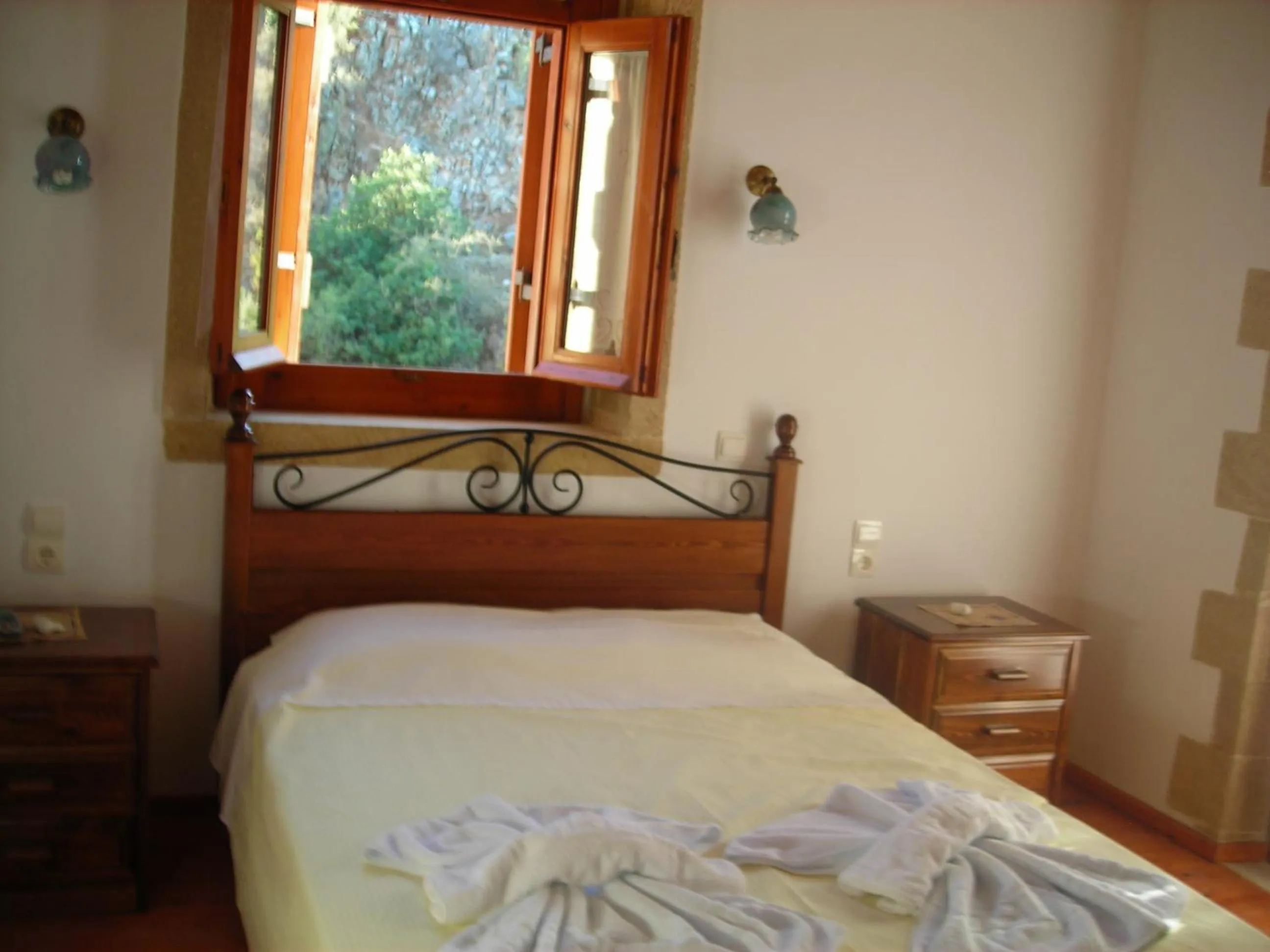 Bed in Patriko Traditional Stone Houses