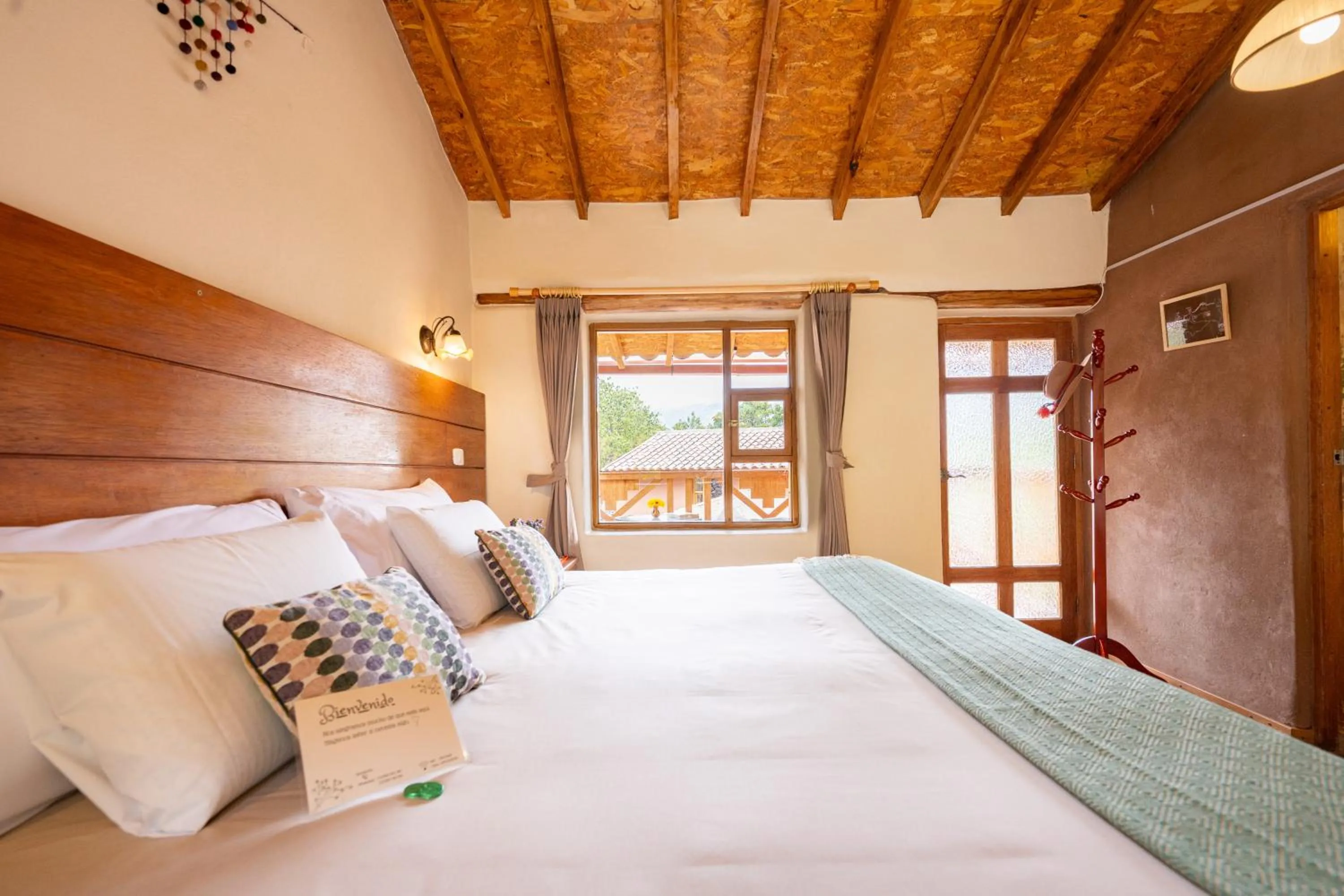 Bed in Unuwasi Hotel & Villa