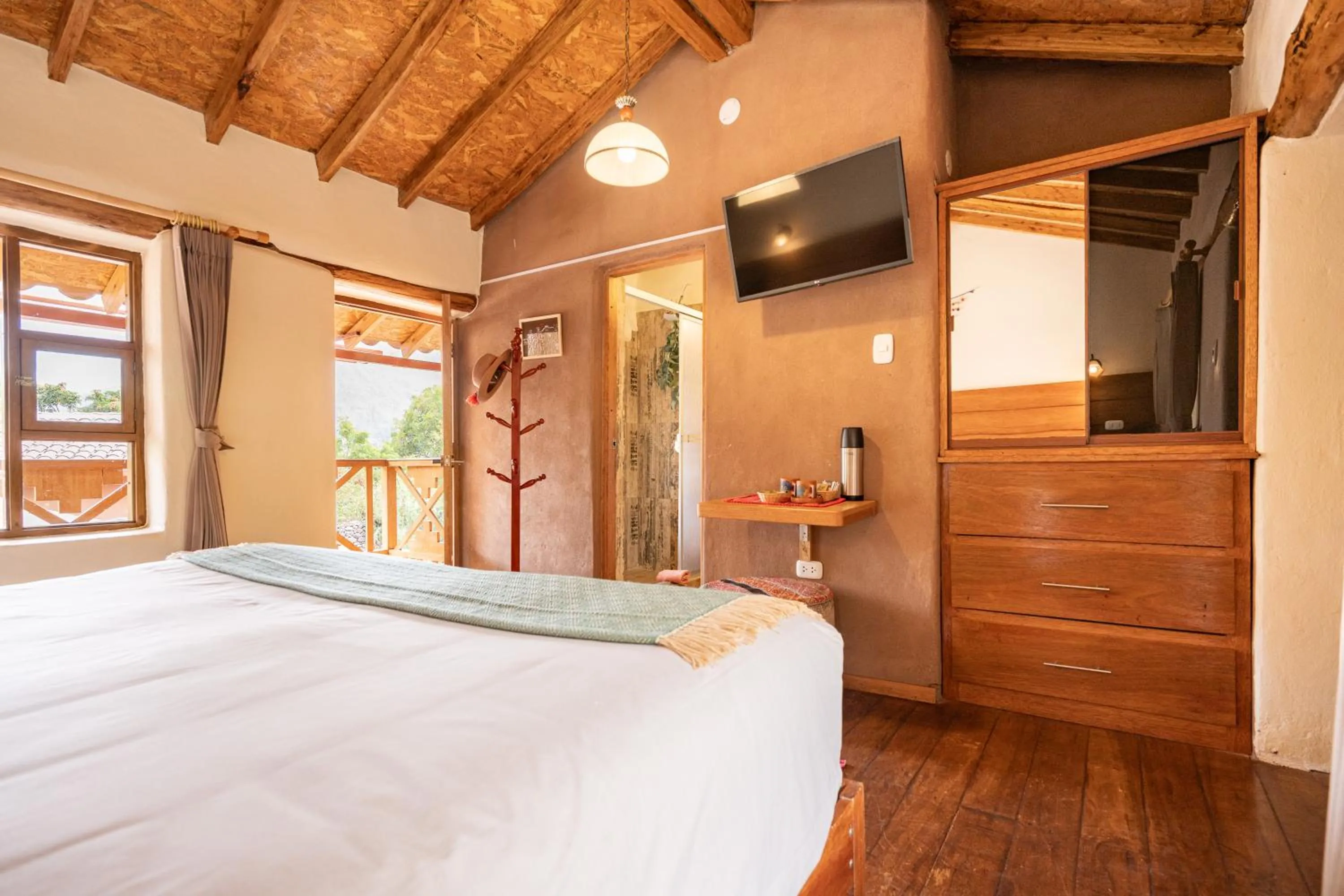 Bed in Unuwasi Hotel & Villa