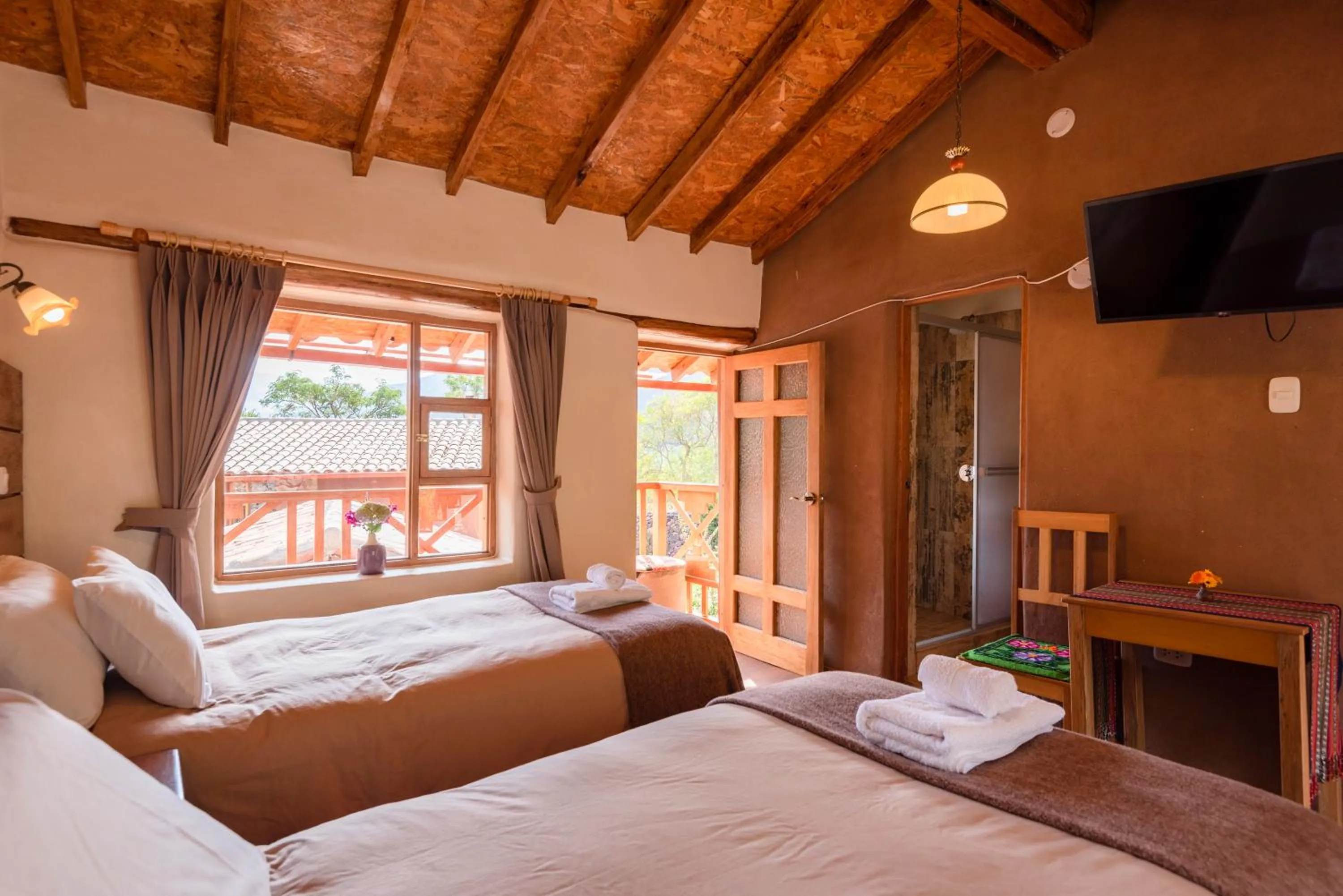 View (from property/room), Bed in Unuwasi Hotel & Villa