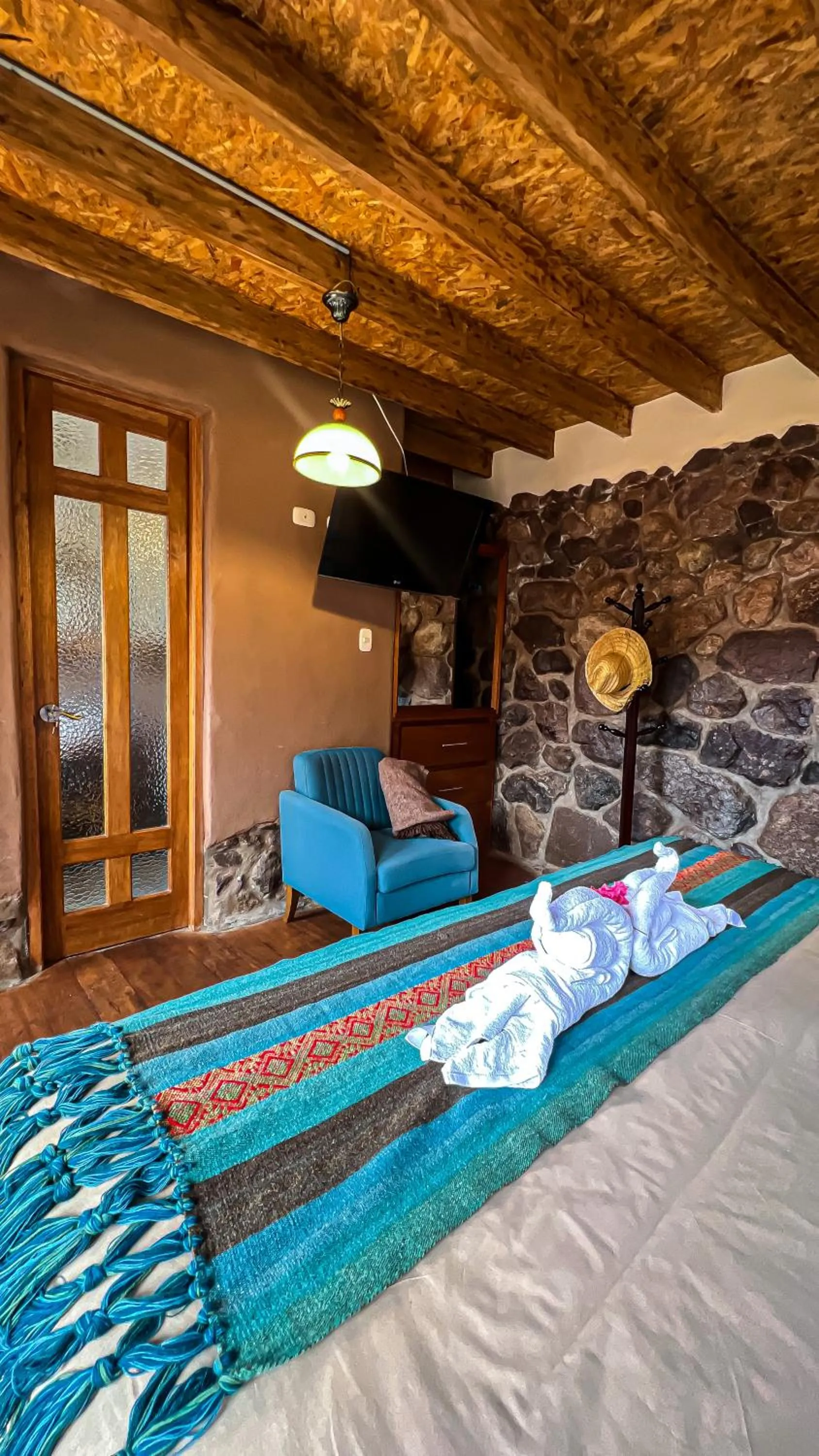 Bed in Unuwasi Hotel & Villa