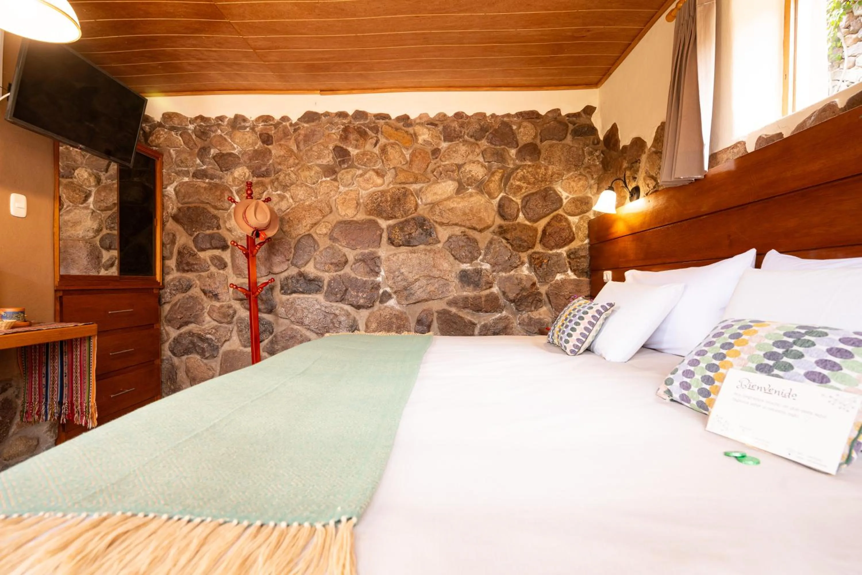 Bed in Unuwasi Hotel & Villa