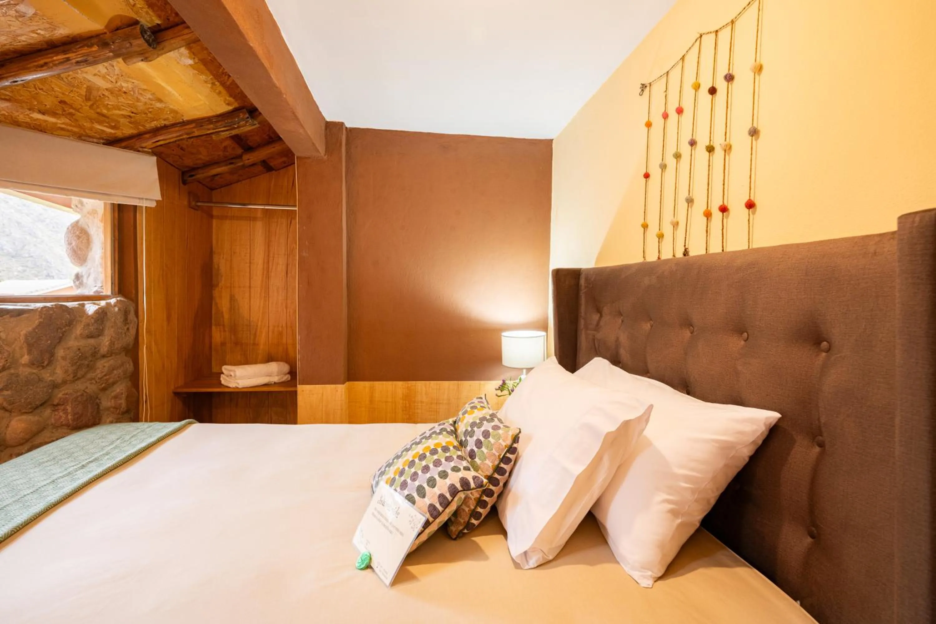 Bed in Unuwasi Hotel & Villa