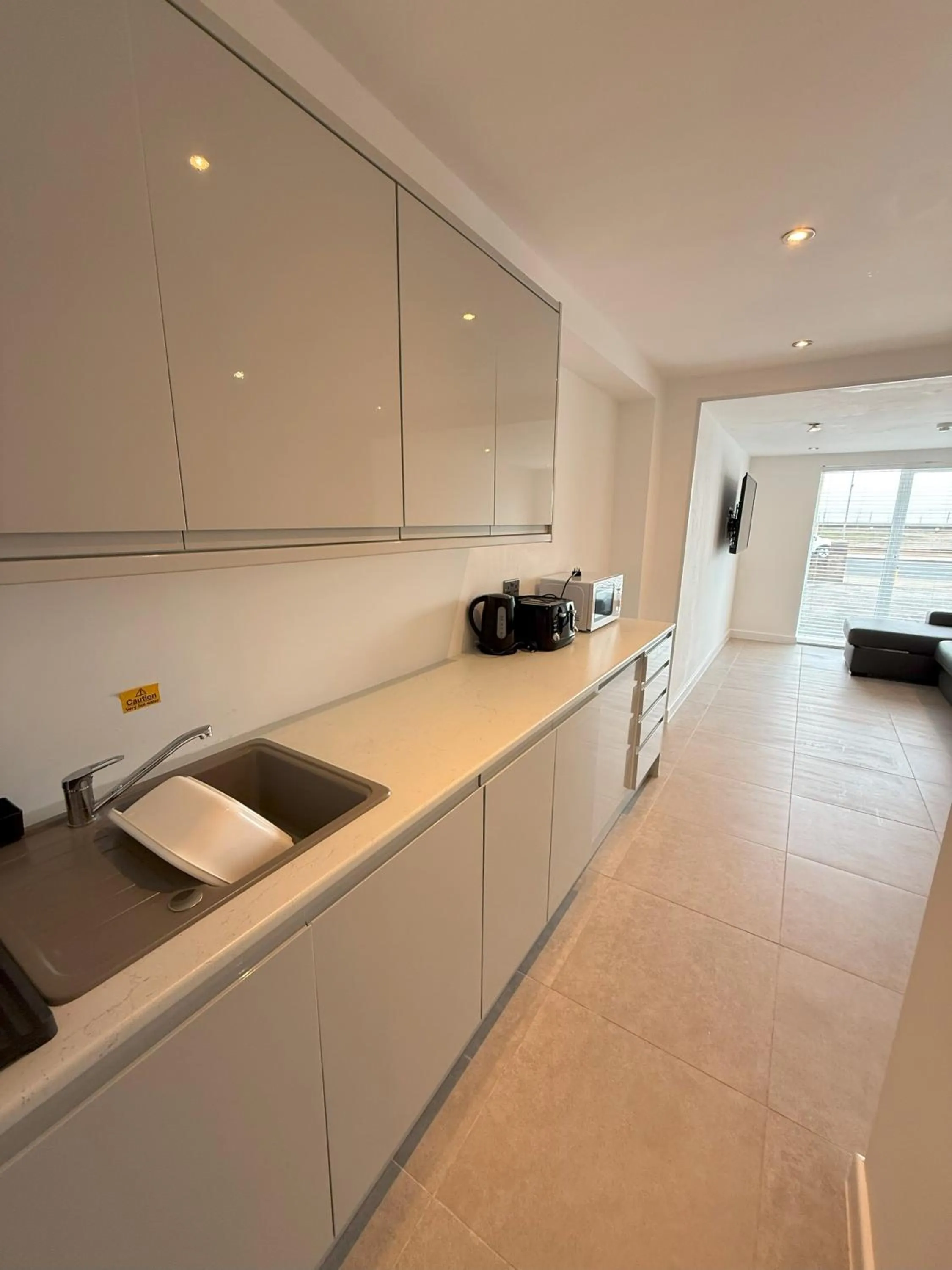 Kitchen or kitchenette in Coastal Plaza