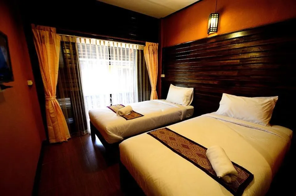 Photo of the whole room, Bed in Baanfai Guesthouse Chiangkhong