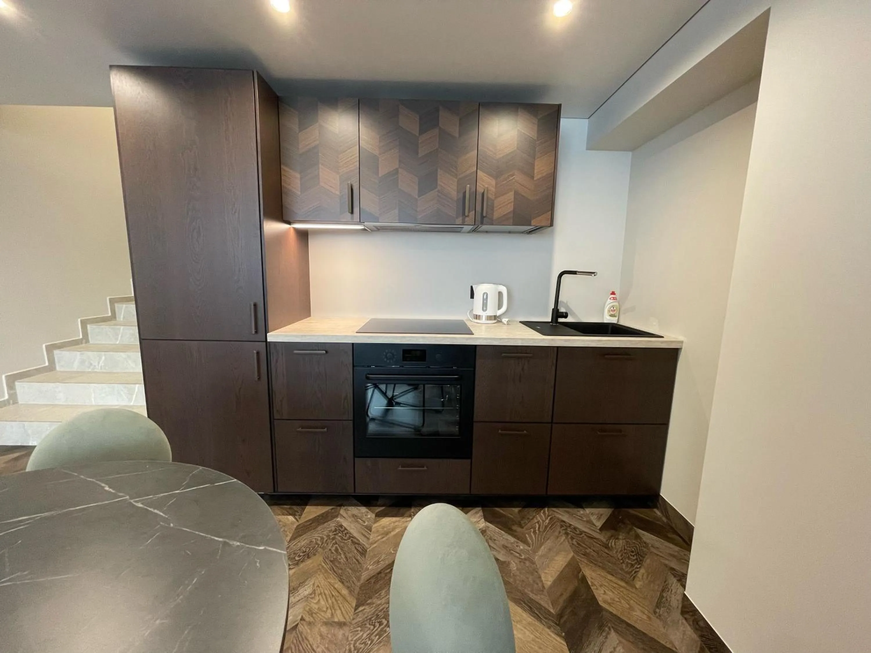 Kitchen or kitchenette in Viešbutis Prie Fontano