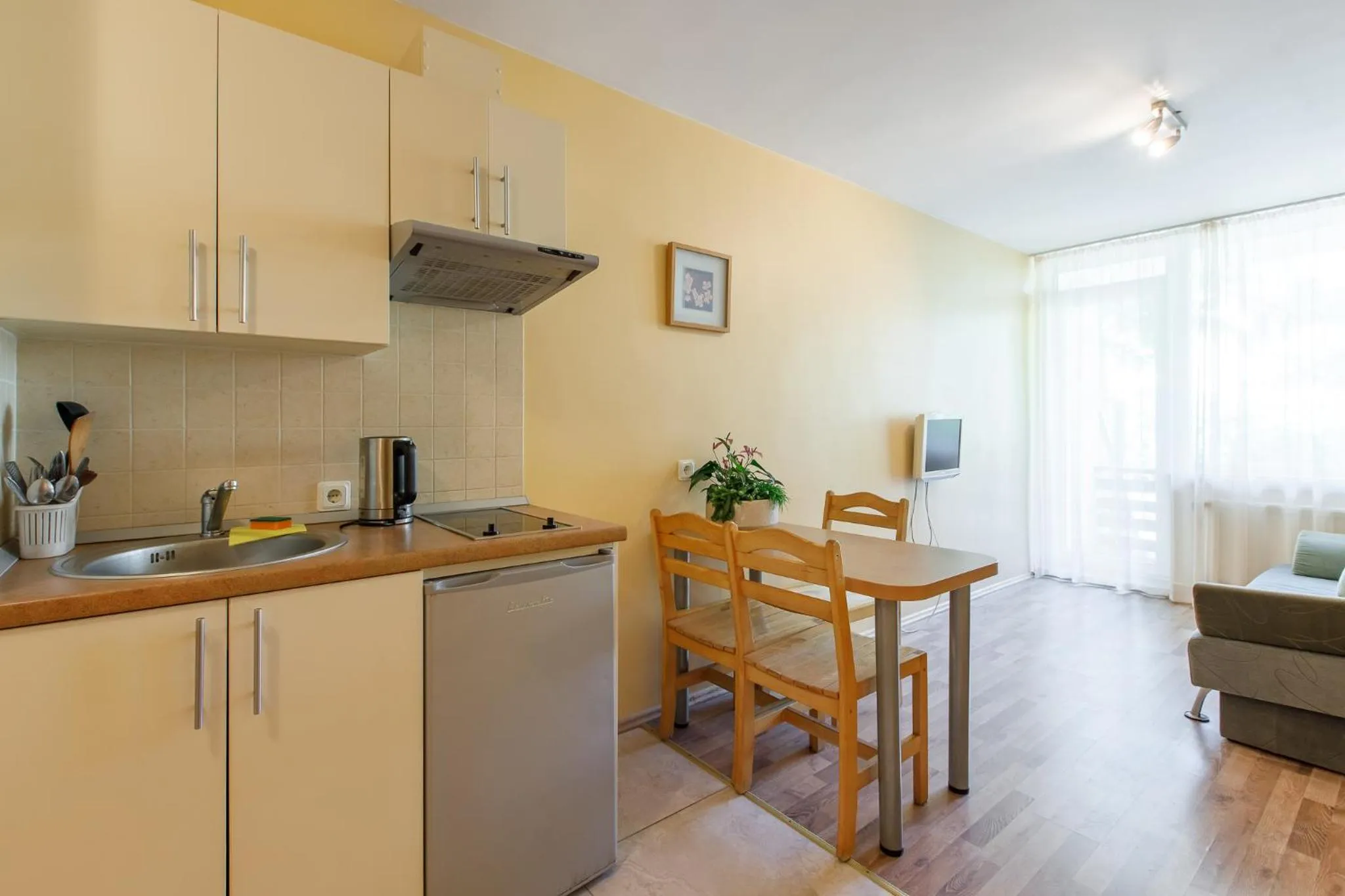 Kitchen or kitchenette in Viešbutis Prie Fontano