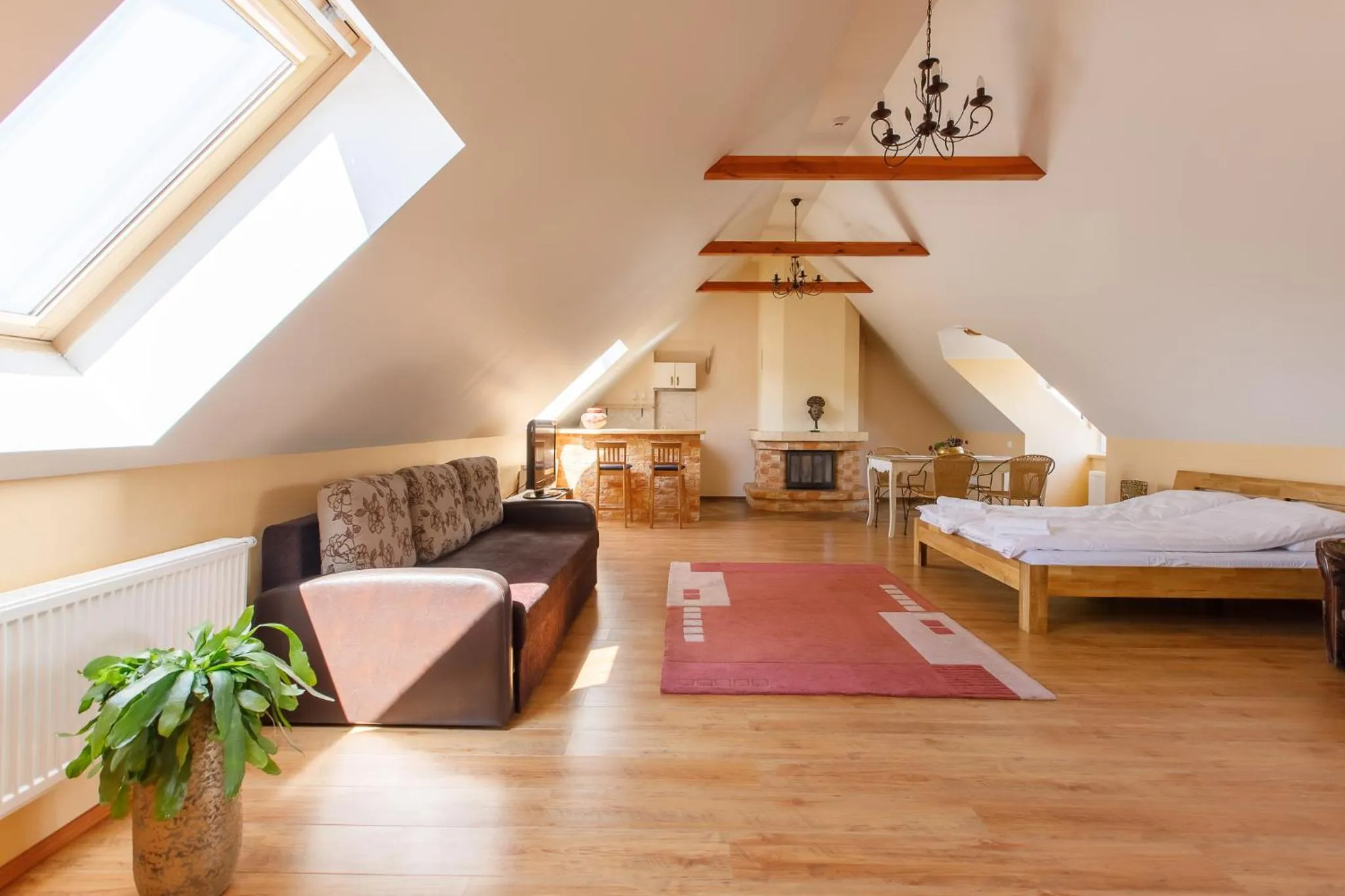 Seating area, Bed in Viešbutis Prie Fontano