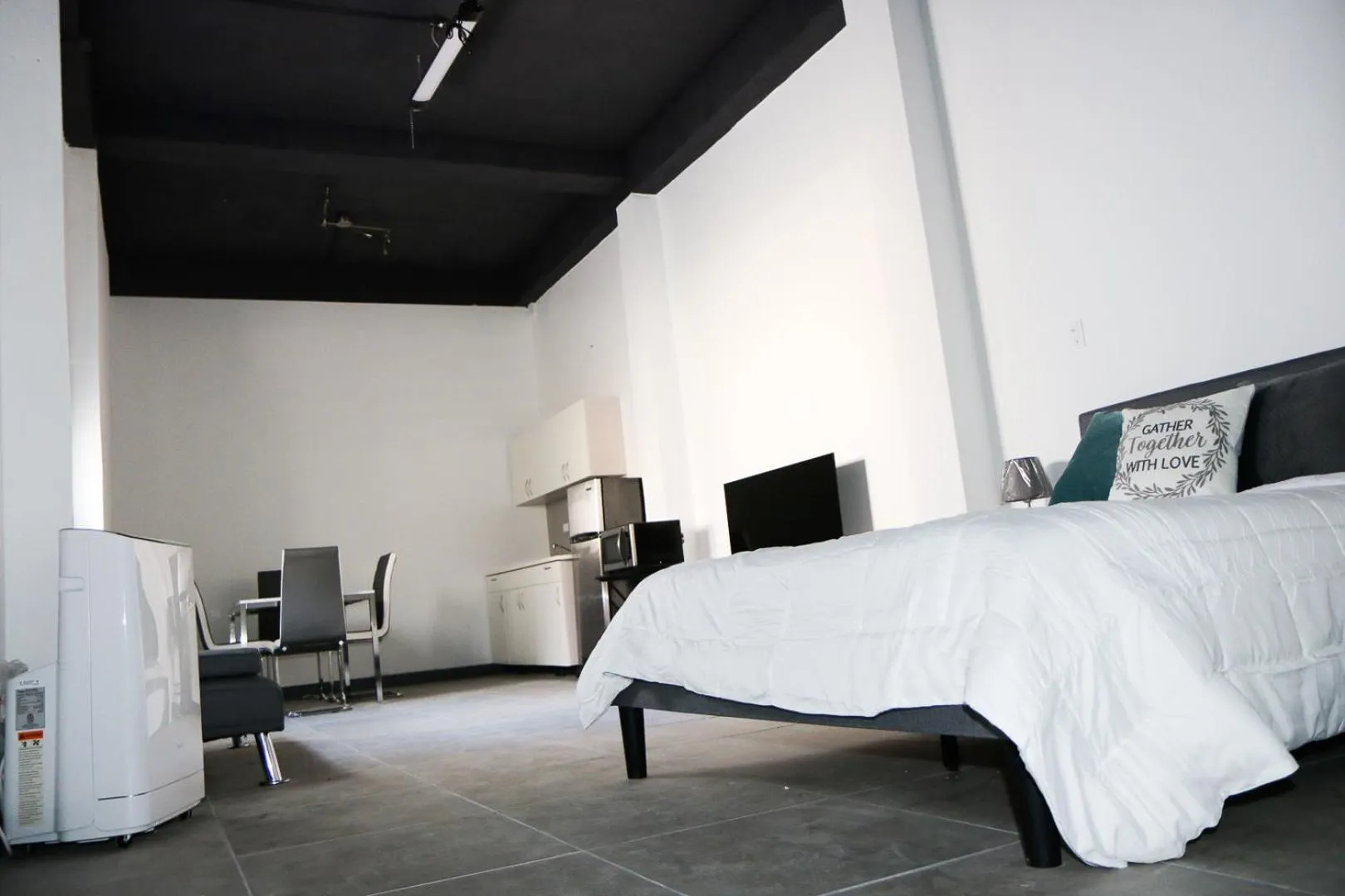 Photo of the whole room, Bed in Mavs Boutique At Ponce