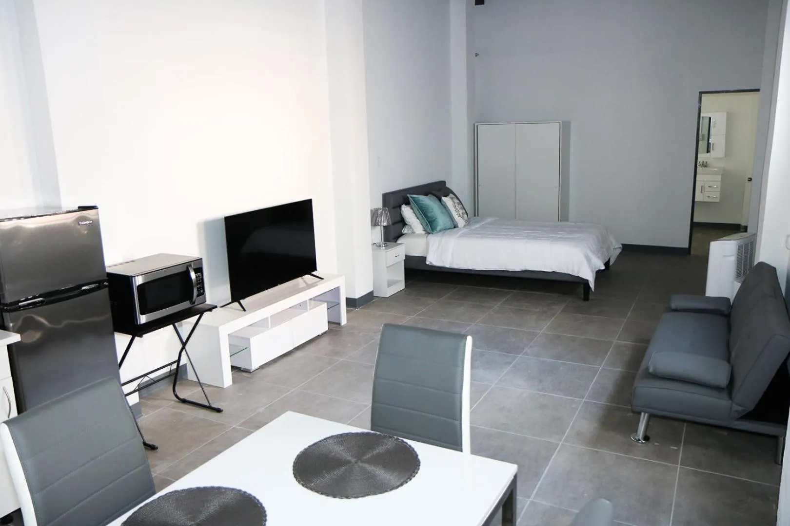 Photo of the whole room, Bed in Mavs Boutique At Ponce