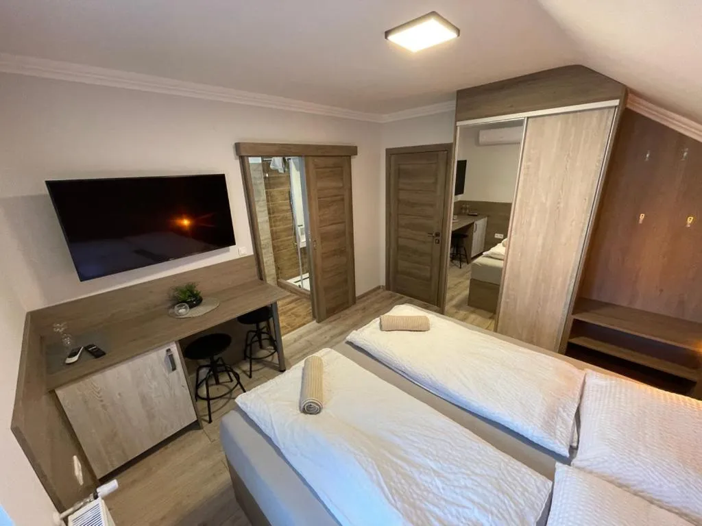 Bed in Kukorica Csárda Apartman