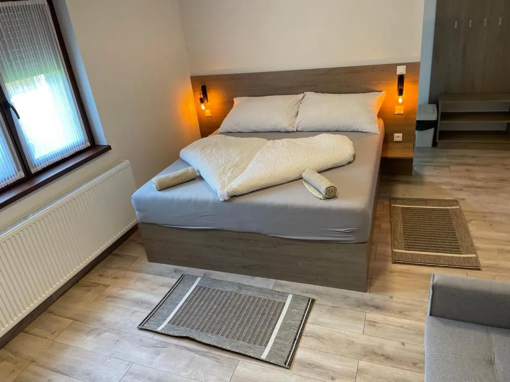 Bed in Kukorica Csárda Apartman