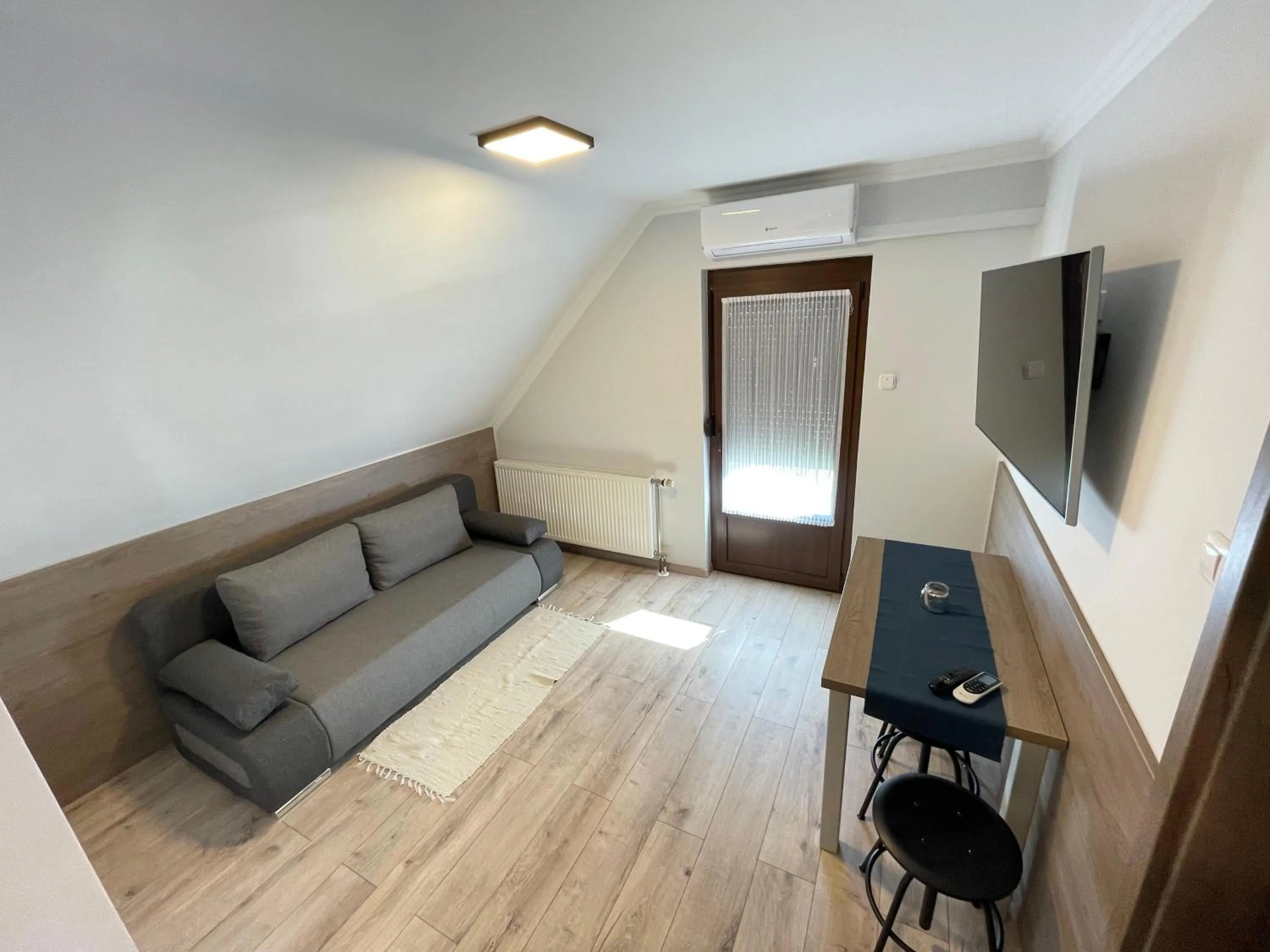 Living room in Kukorica Csárda Apartman