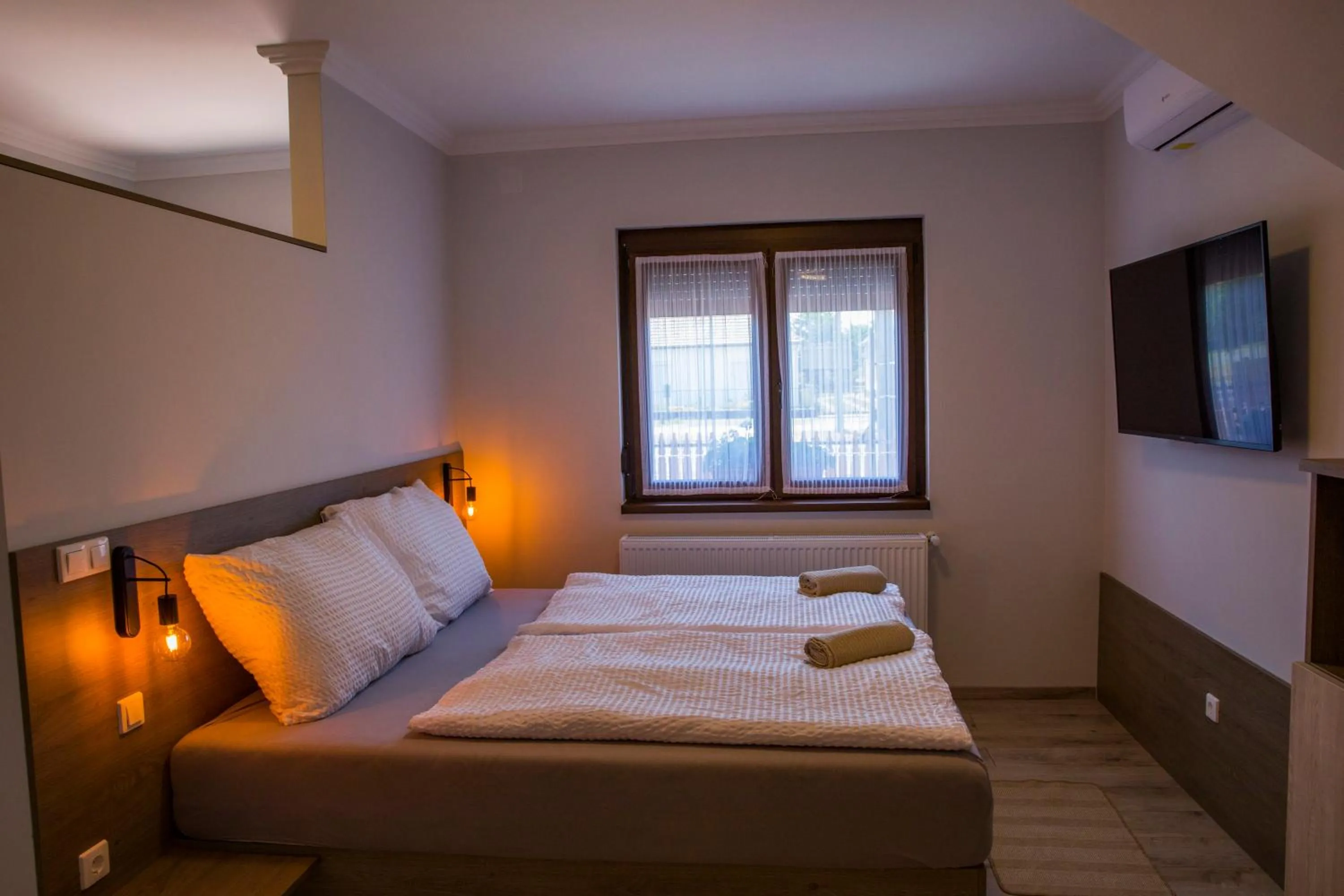 Bed in Kukorica Csárda Apartman