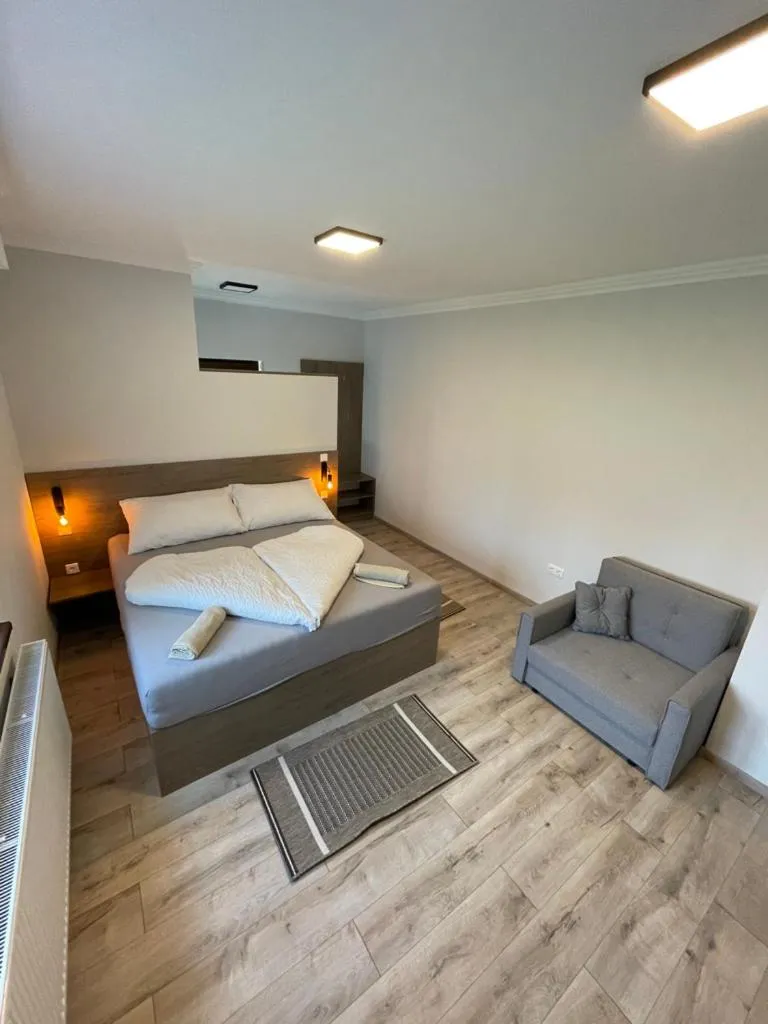 Bed in Kukorica Csárda Apartman