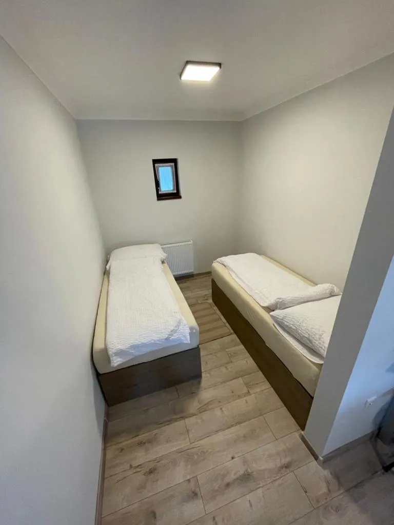 Bed in Kukorica Csárda Apartman