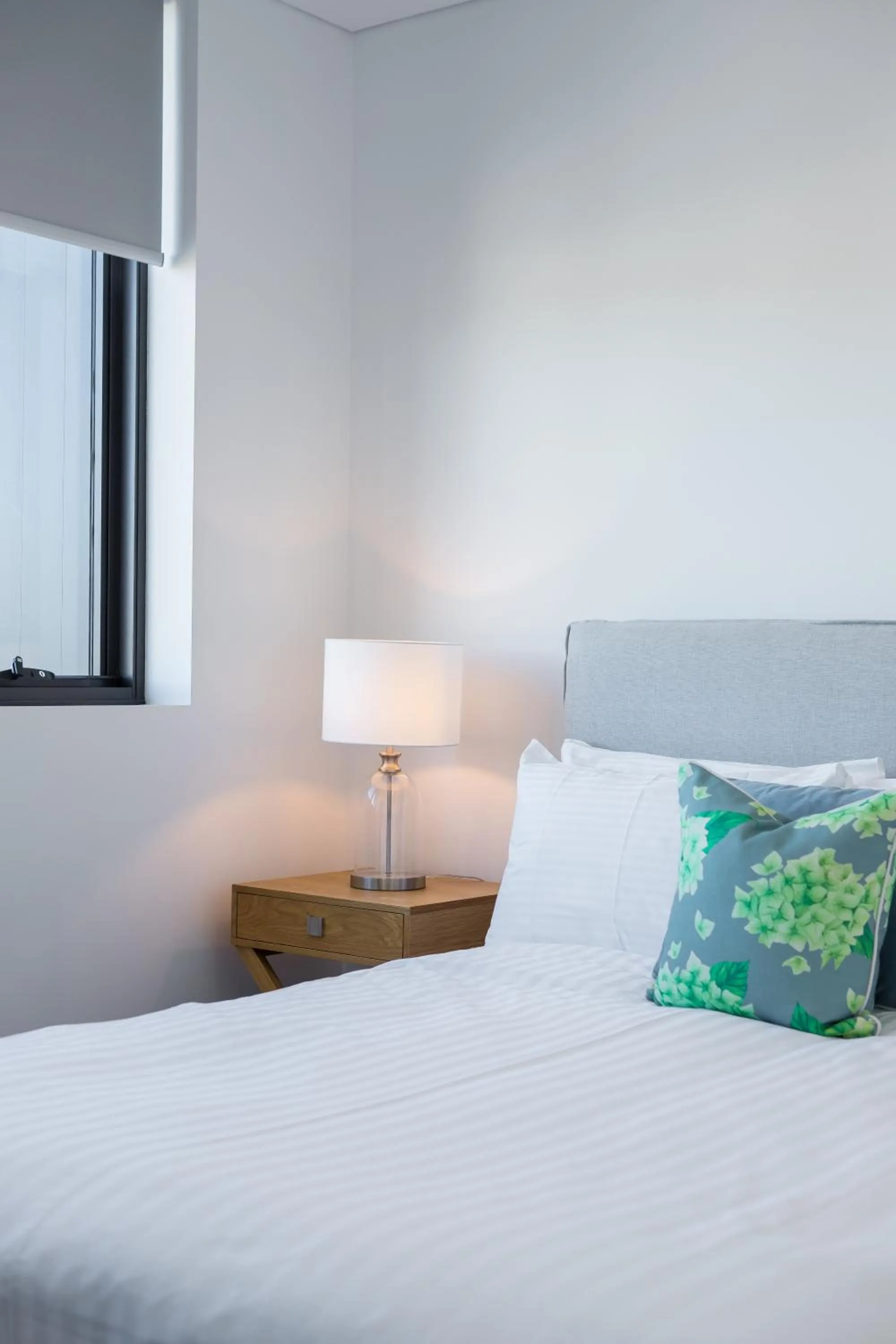 Bed in Inspire Boutique Apartments