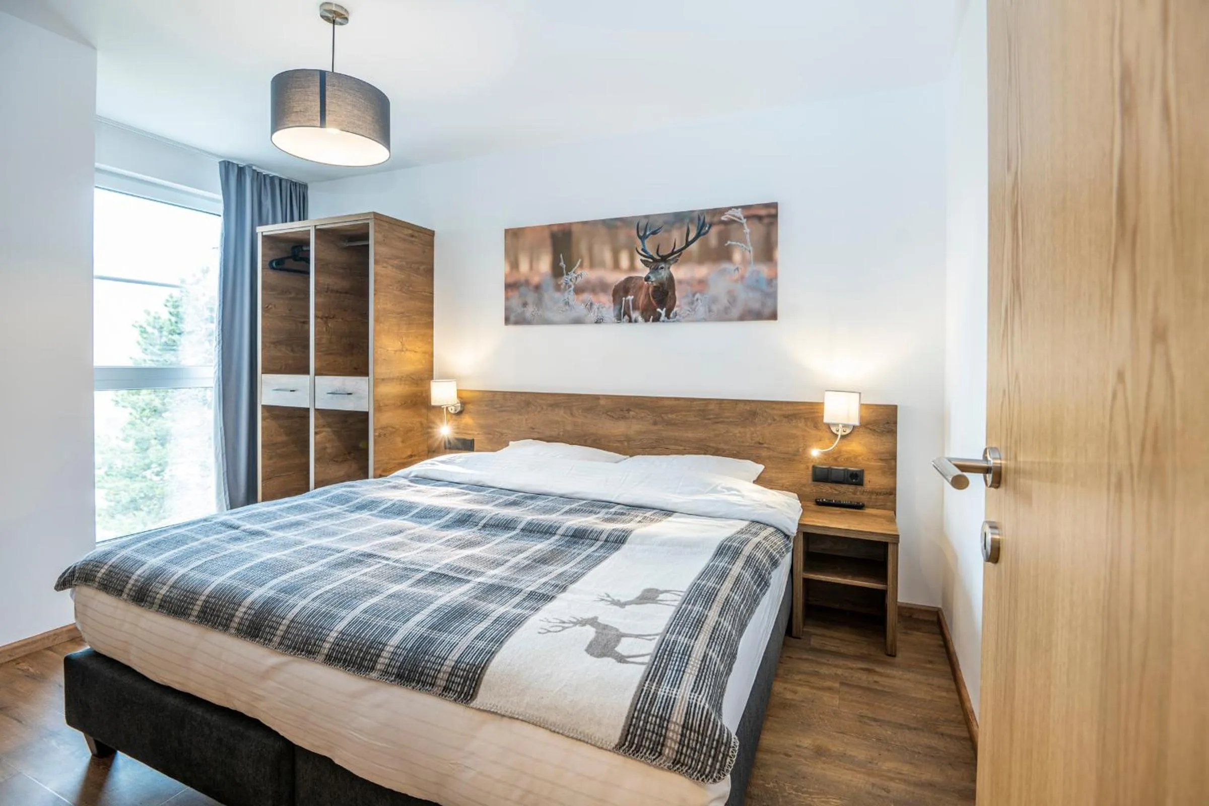 Bed in AlpenParks Hotel & Apartment Alpendorf