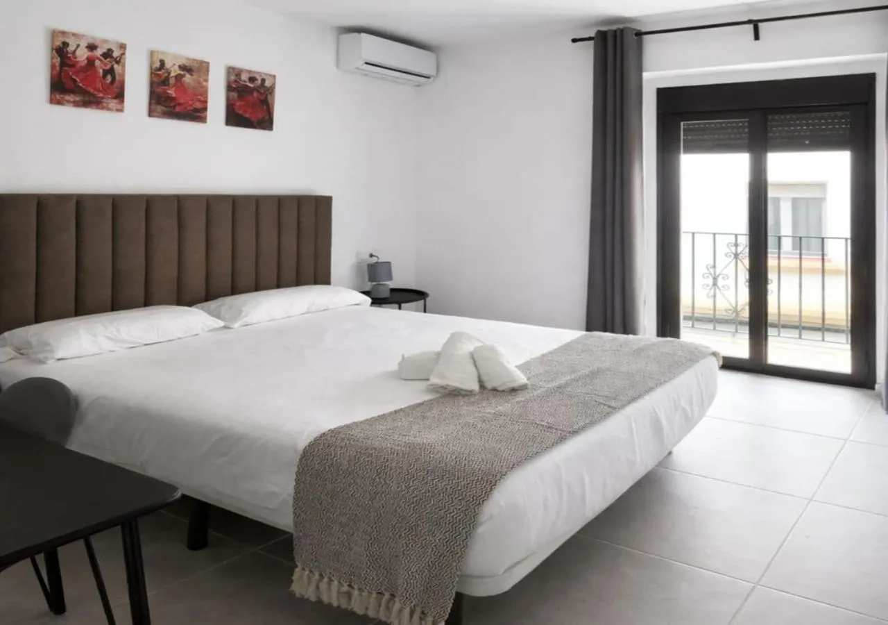Bed in Villamarta Boutique Rooms