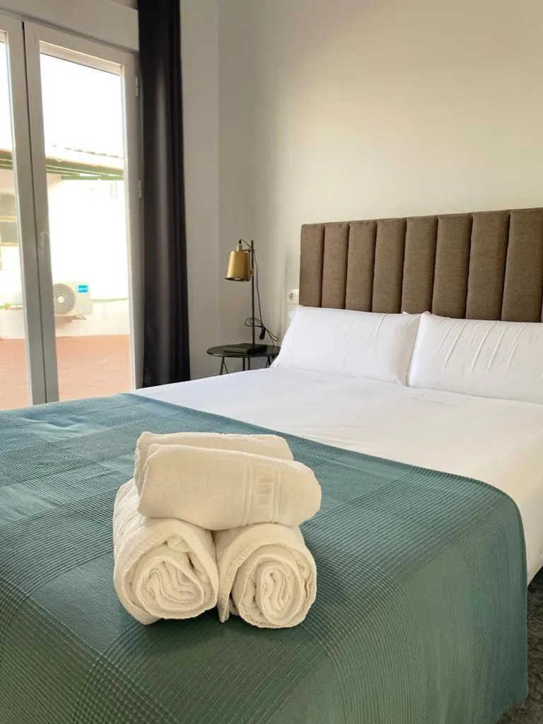 Bed in Villamarta Boutique Rooms