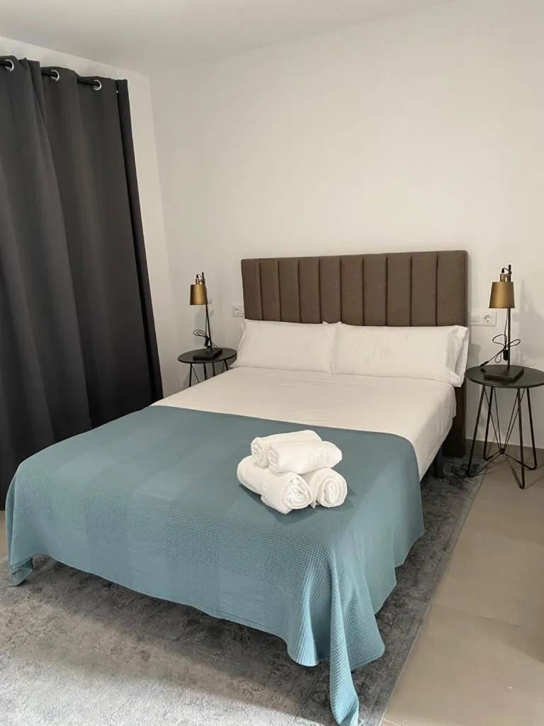 Bed in Villamarta Boutique Rooms