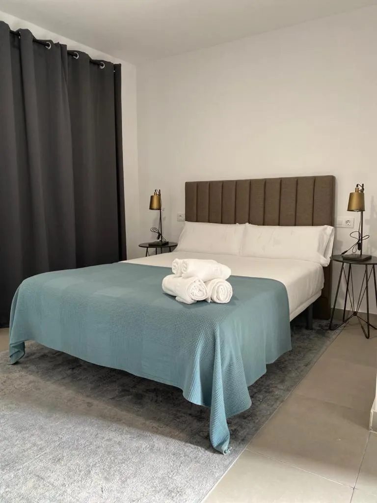 Bed in Villamarta Boutique Rooms